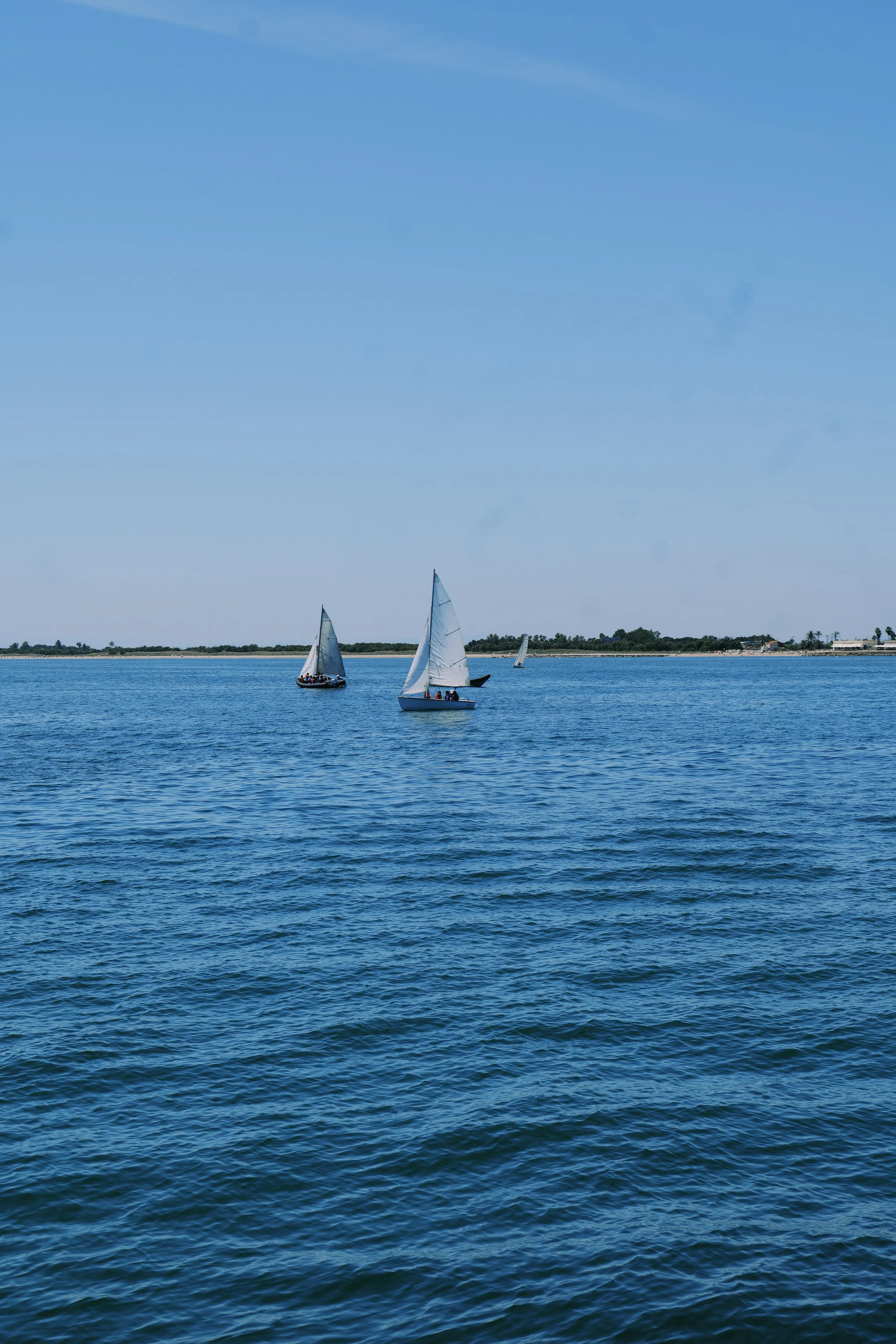 A full-day experience aboard a Private sailboat or catamaran embodies exclusivity, freedom, and the Mediterranean lifestyle in the premium nautical tourism sector.