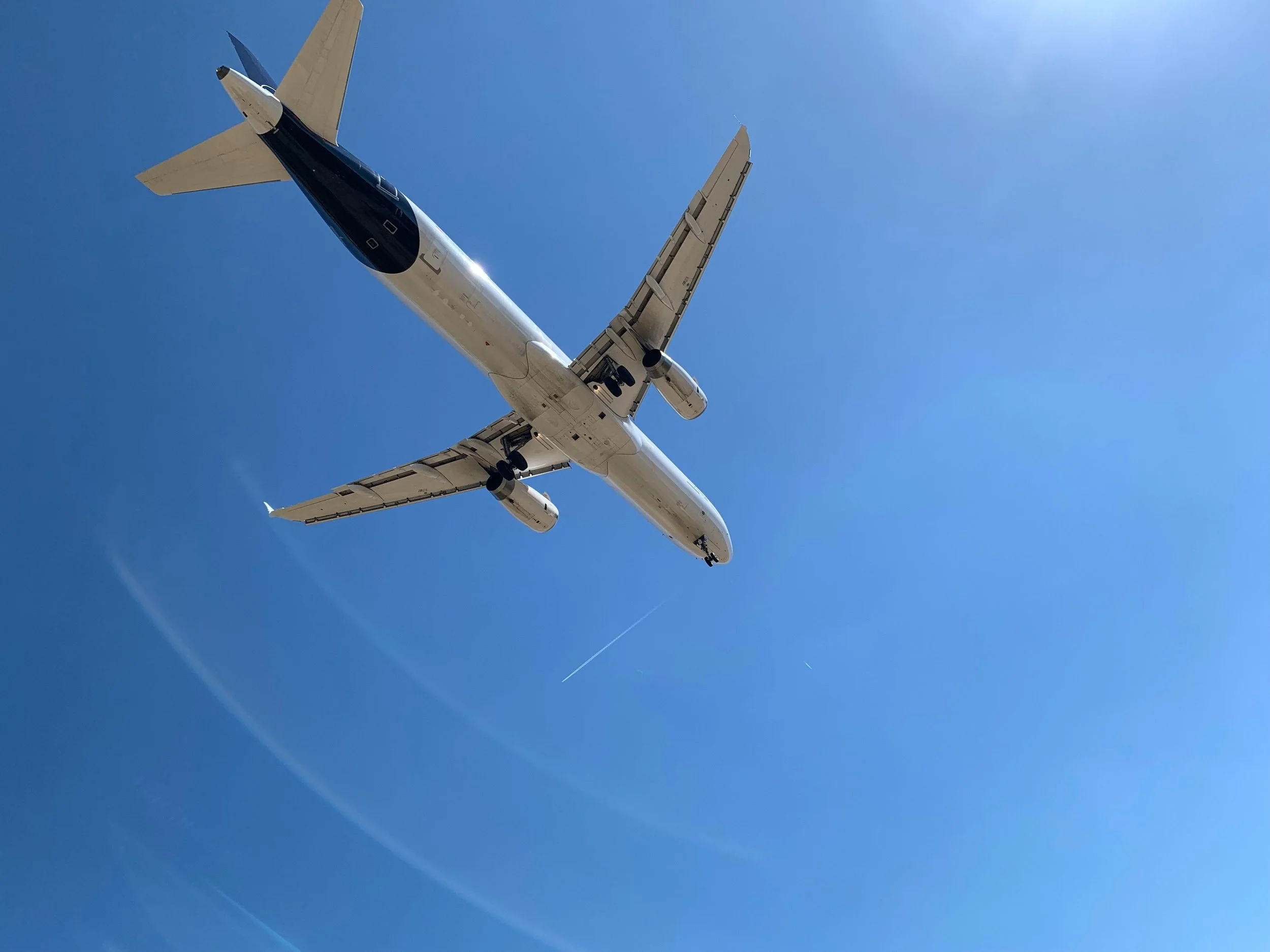 Plane flying in a blue sky