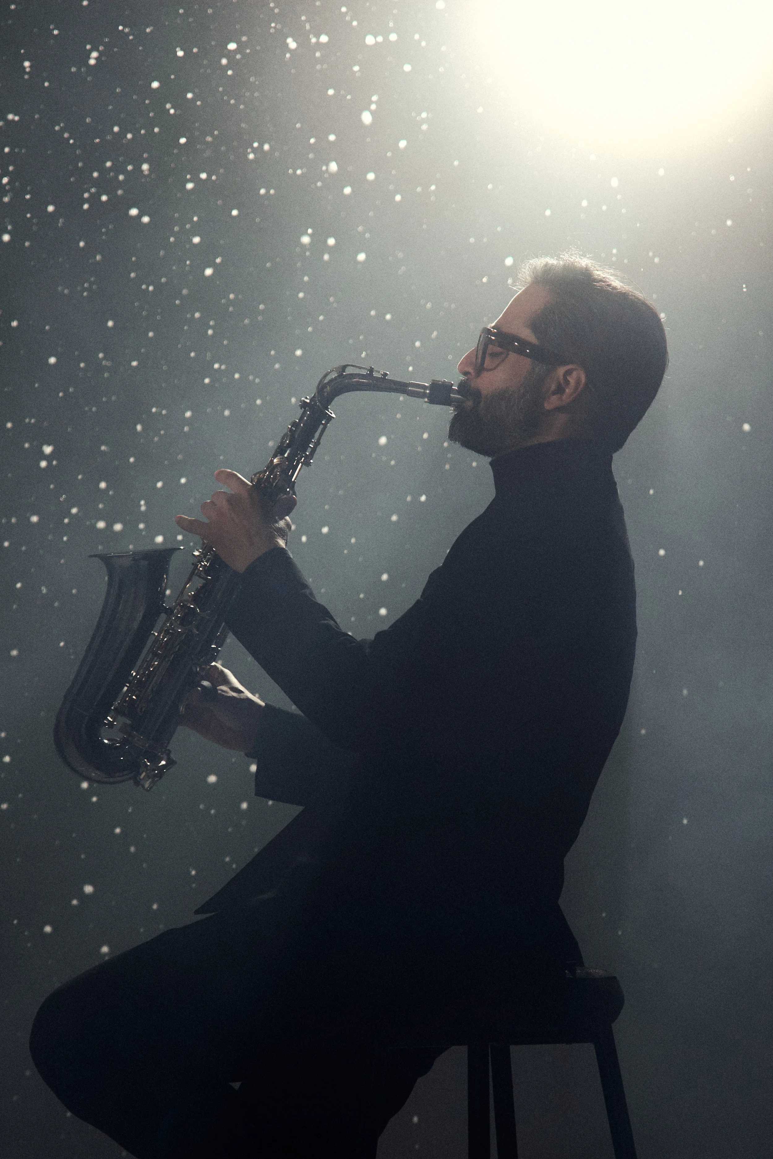 Night performance with cinematic saxophone vibes.