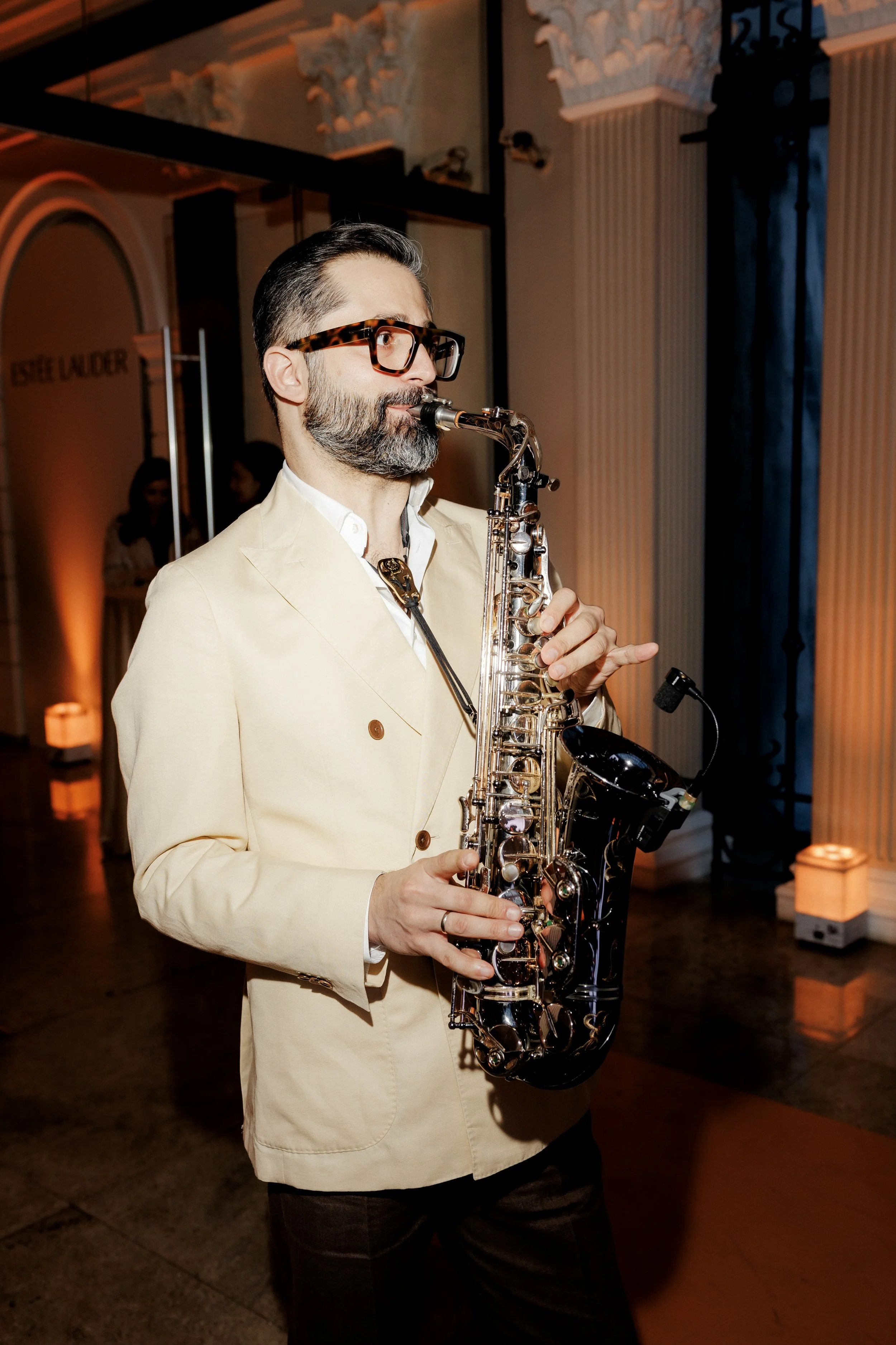 Elegant cocktail hour saxophone performance. 