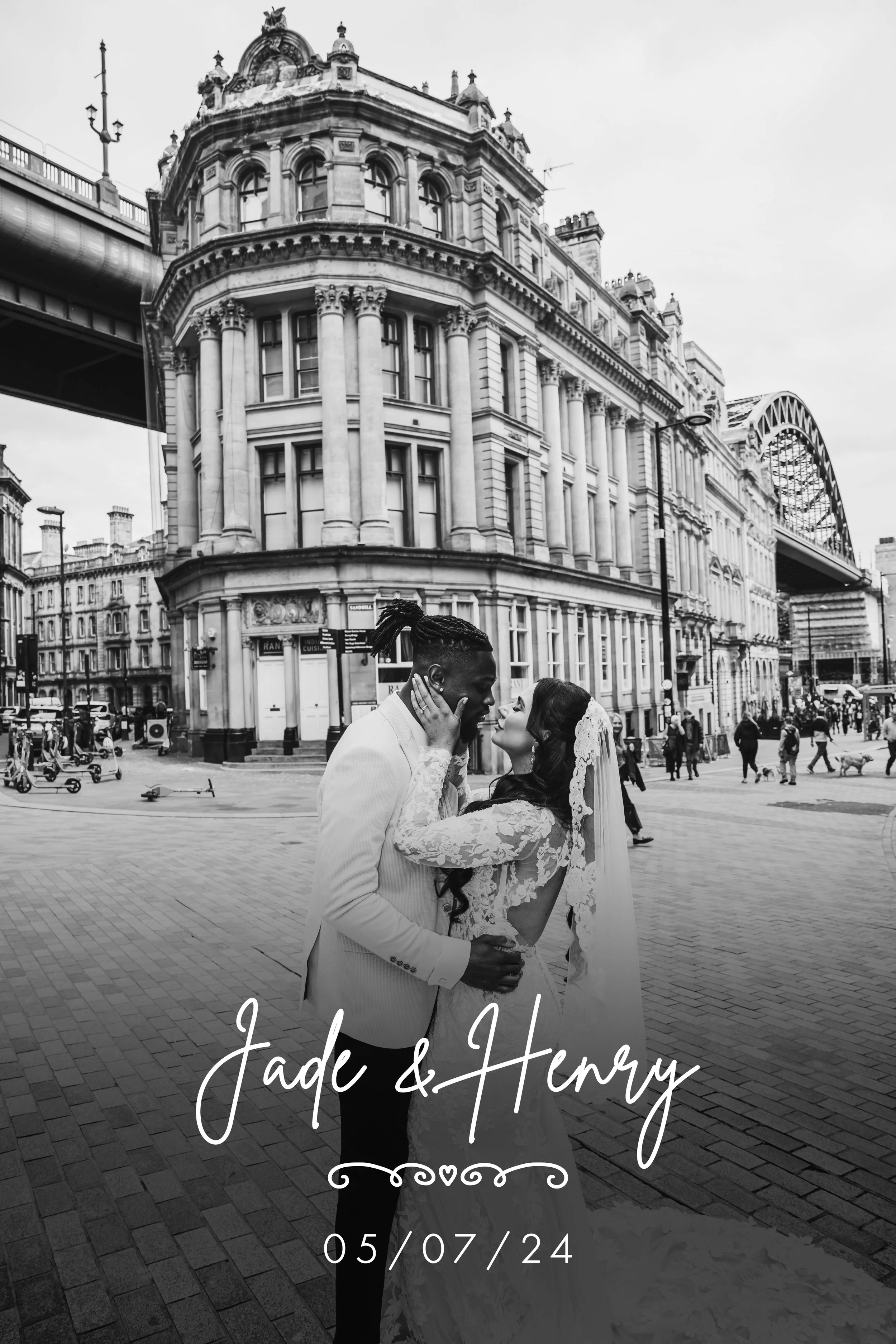 A black and white photo of a bride and groom sharing a kiss on a city street, with a historic building and the Sydney Harbour Bridge in the background. Text overlay reads "Jade & Henry" and the date "05/07/24."