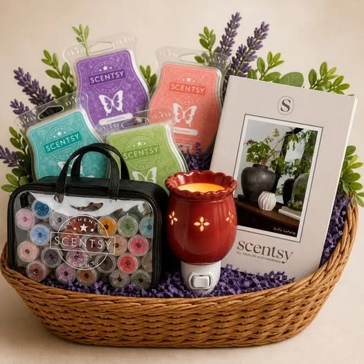 A wicker basket filled with Scentsy products, including four wax bars in blue, purple, pink and green. A red mini warmer, a catalog and a bag of fragrance testers also fill the basket, This is what makes up a basket party.