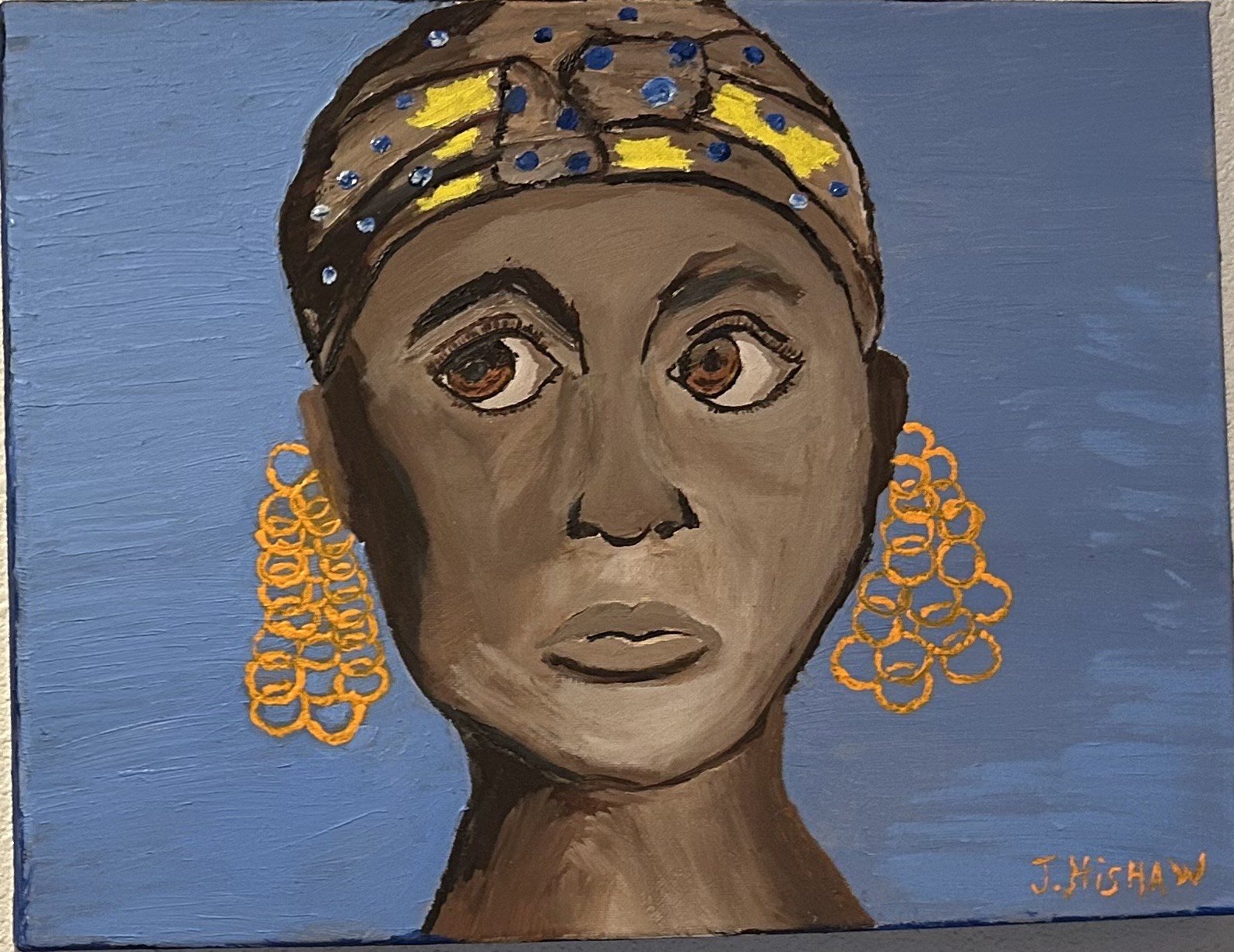 A painting of a woman with dark skin, large brown eyes, and full lips, wearing a beaded headwrap with blue and yellow accents and large orange hoop earrings, set against a blue background. The artist's signature, J. Hishaw, is visible in the bottom right corner.