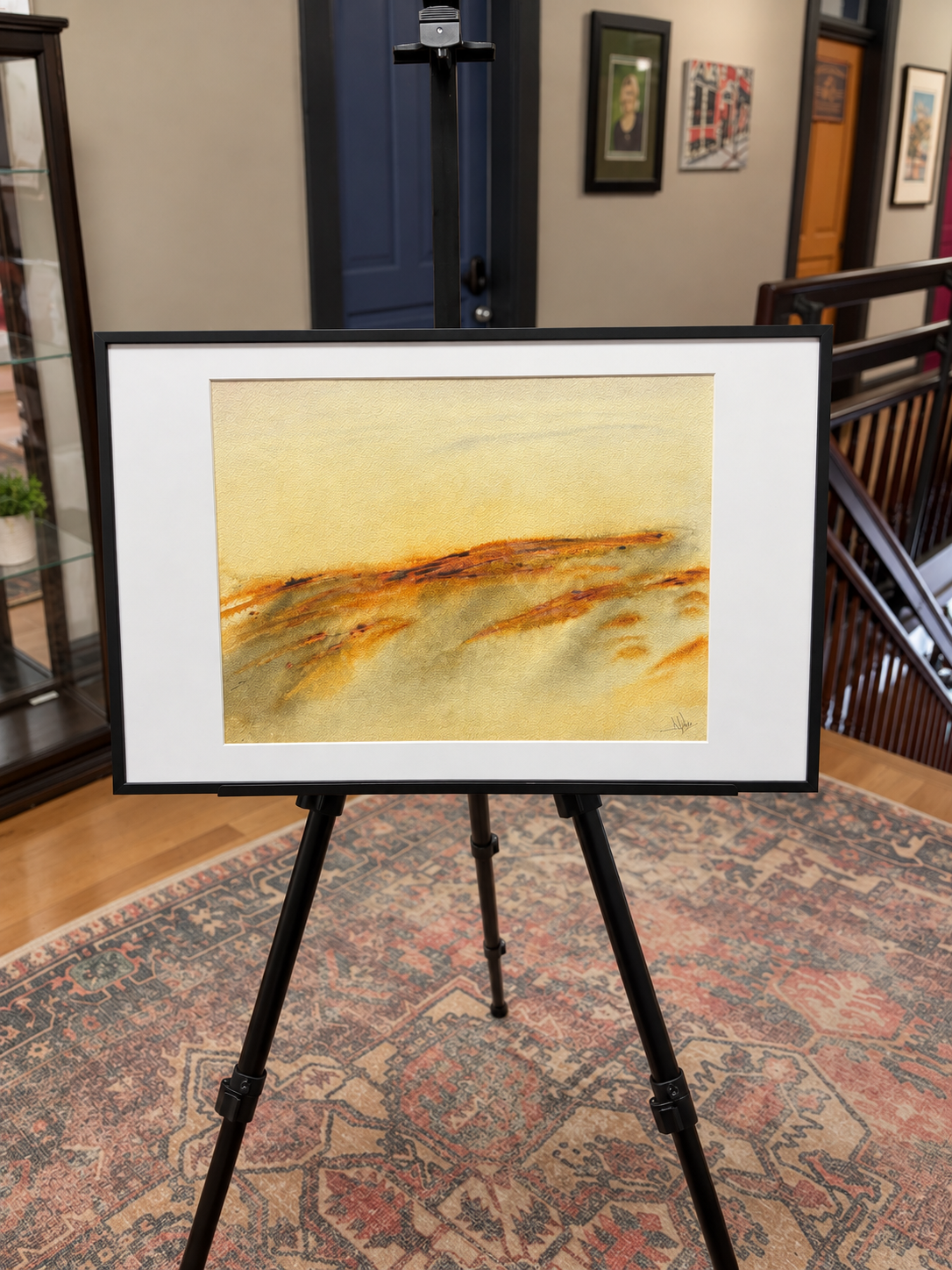 Abstract Watercolor Landscape on Easel.png