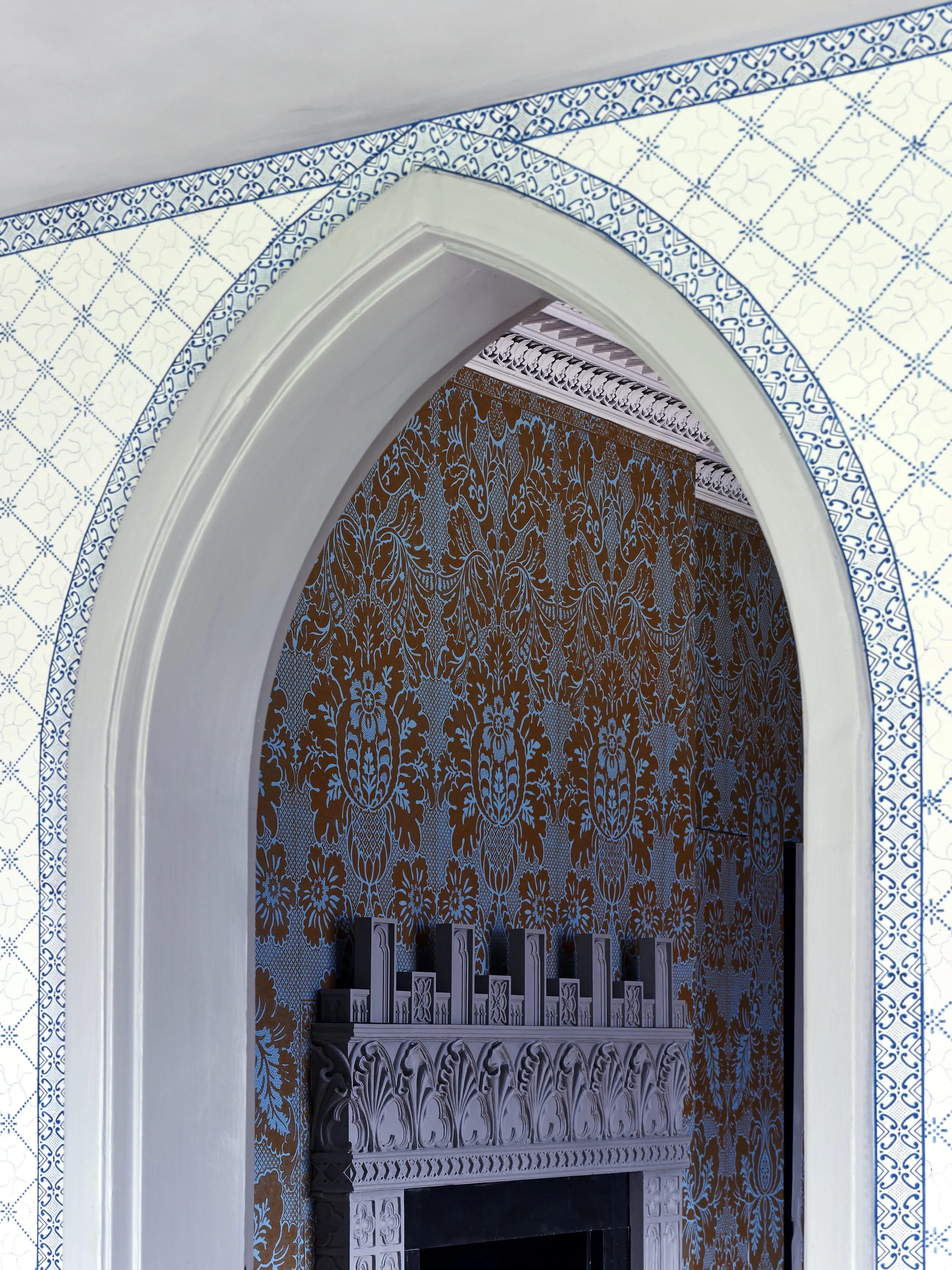 Foreground: Strawberry Hill Plaid with Strawberry Hill Border. Beyond the doorway: Walpole Damask. Strawberry Hill House & Garden, Twickenham, United Kingdom.