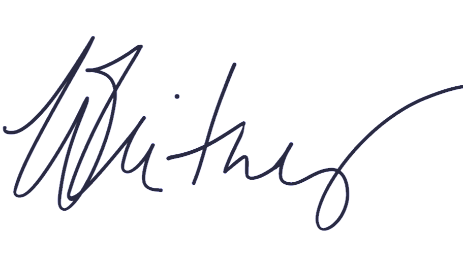 A signature in purple ink with cursive handwriting.