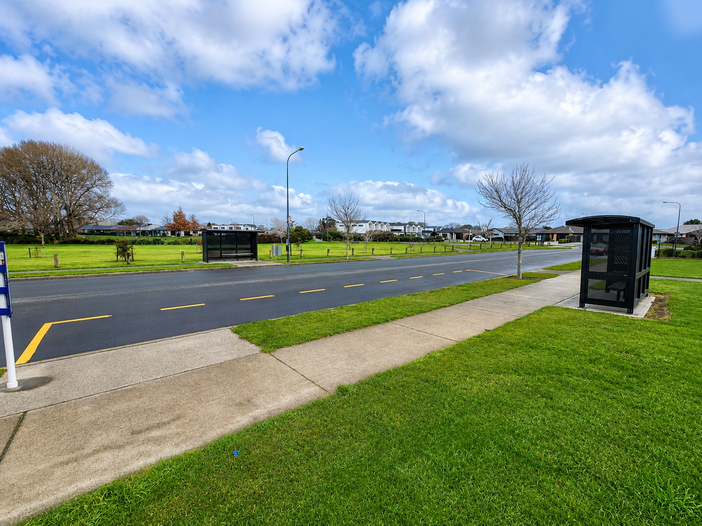 Bus stops on Silverstream Boulevard near Silverstream Retail Village in Kaiapoi, providing convenient public transport access.