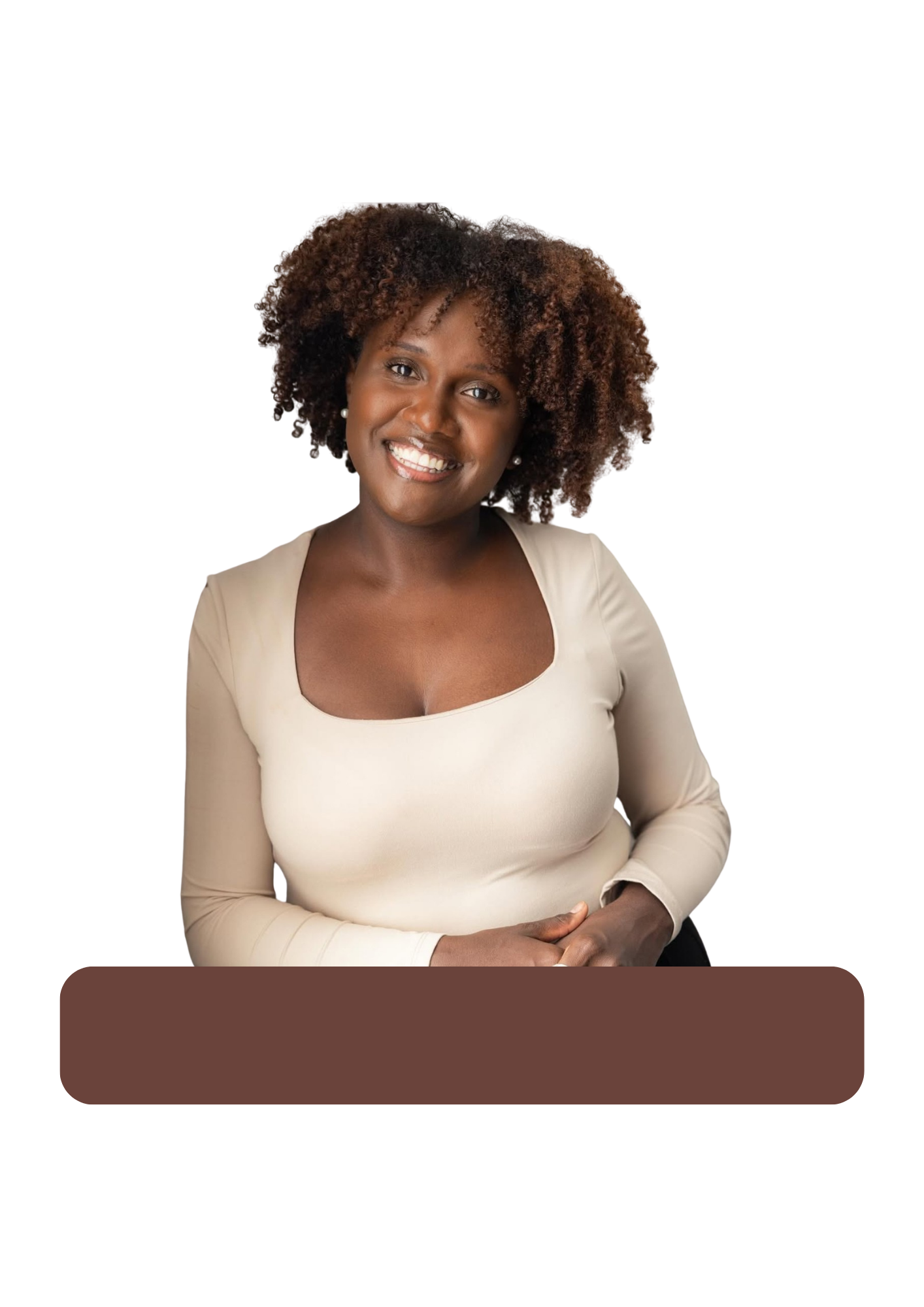 Portrait of an African American woman with curly hair, wearing a beige long-sleeve top, smiling with arms crossed