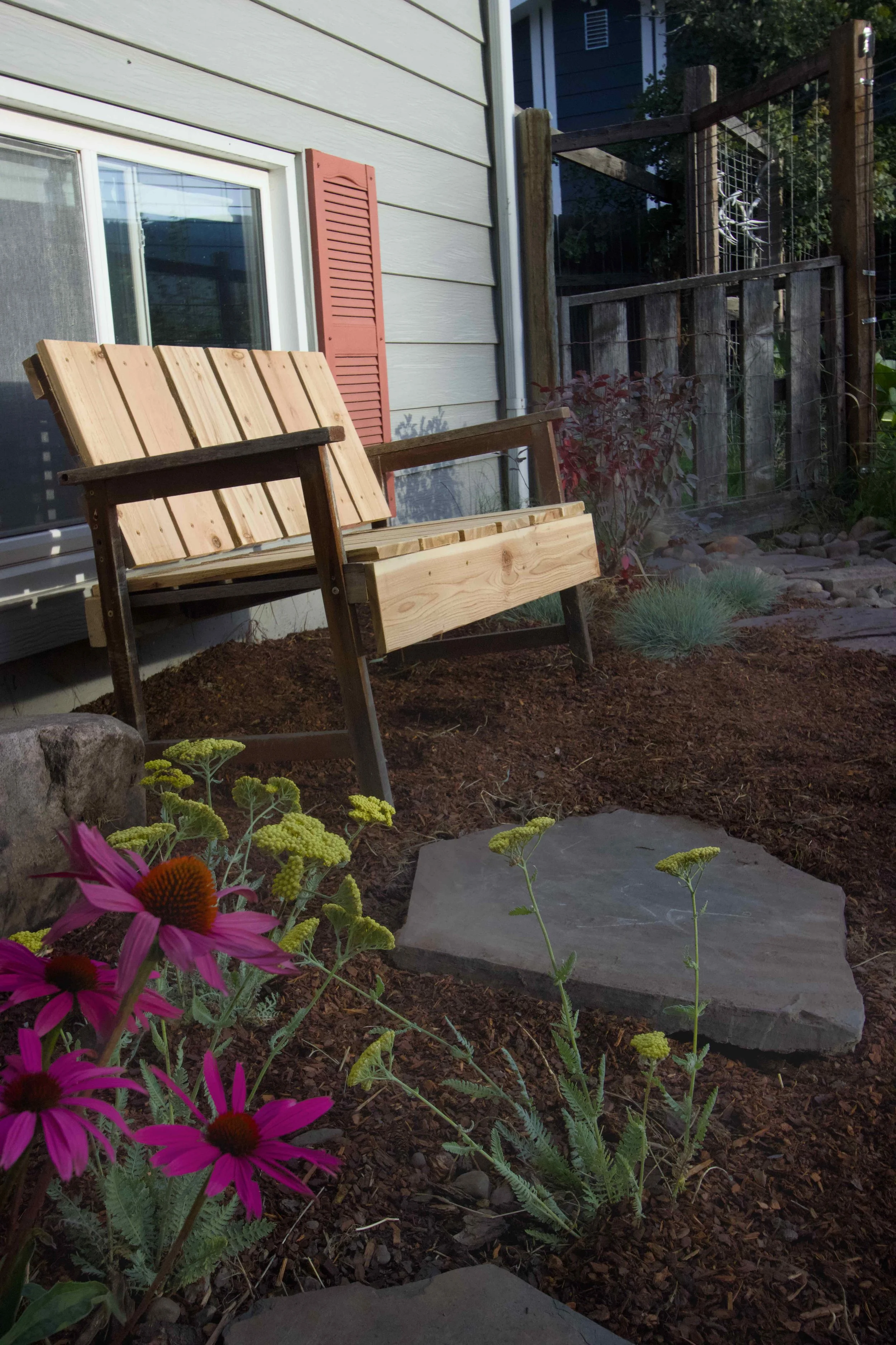 Jess and Ben bench with coneflowers 2.jpg