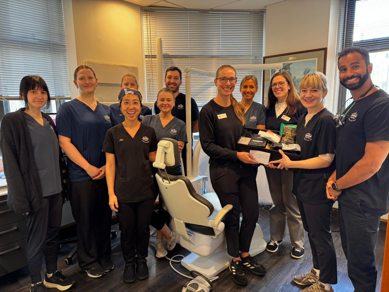 New Zealand dentist and dental team caring for patients