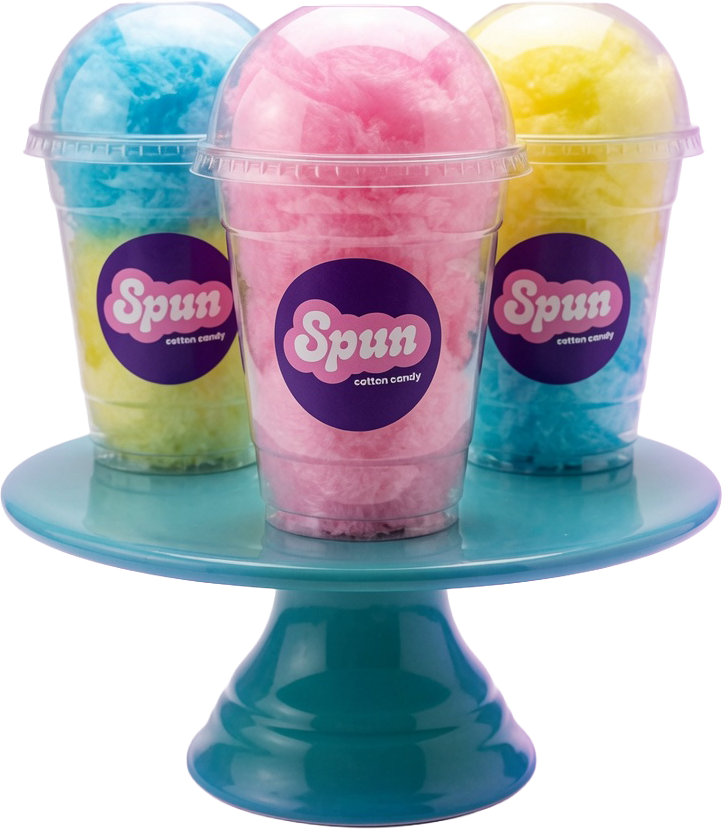 Three cups of cotton candy in pink, yellow, and blue, labeled 'Spun cotton candy,' placed on a light blue cake stand.