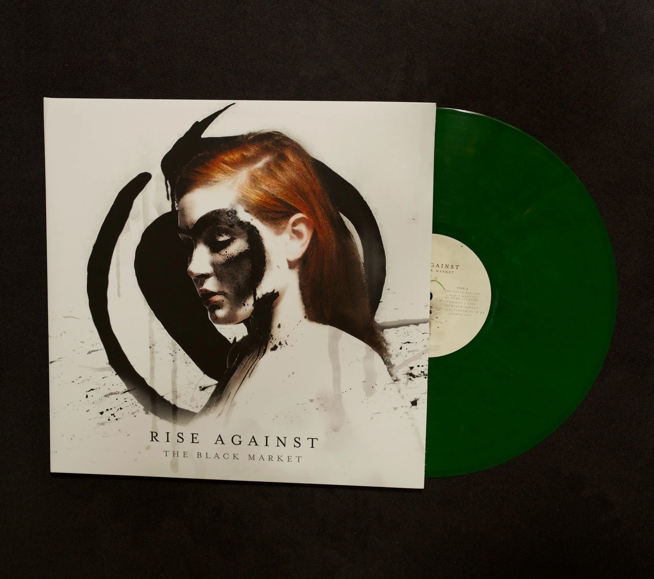 Rise Against - The Black Market - Hot Topic Exclusive Transparent Green/Yellow Swirl Limited 1/1500