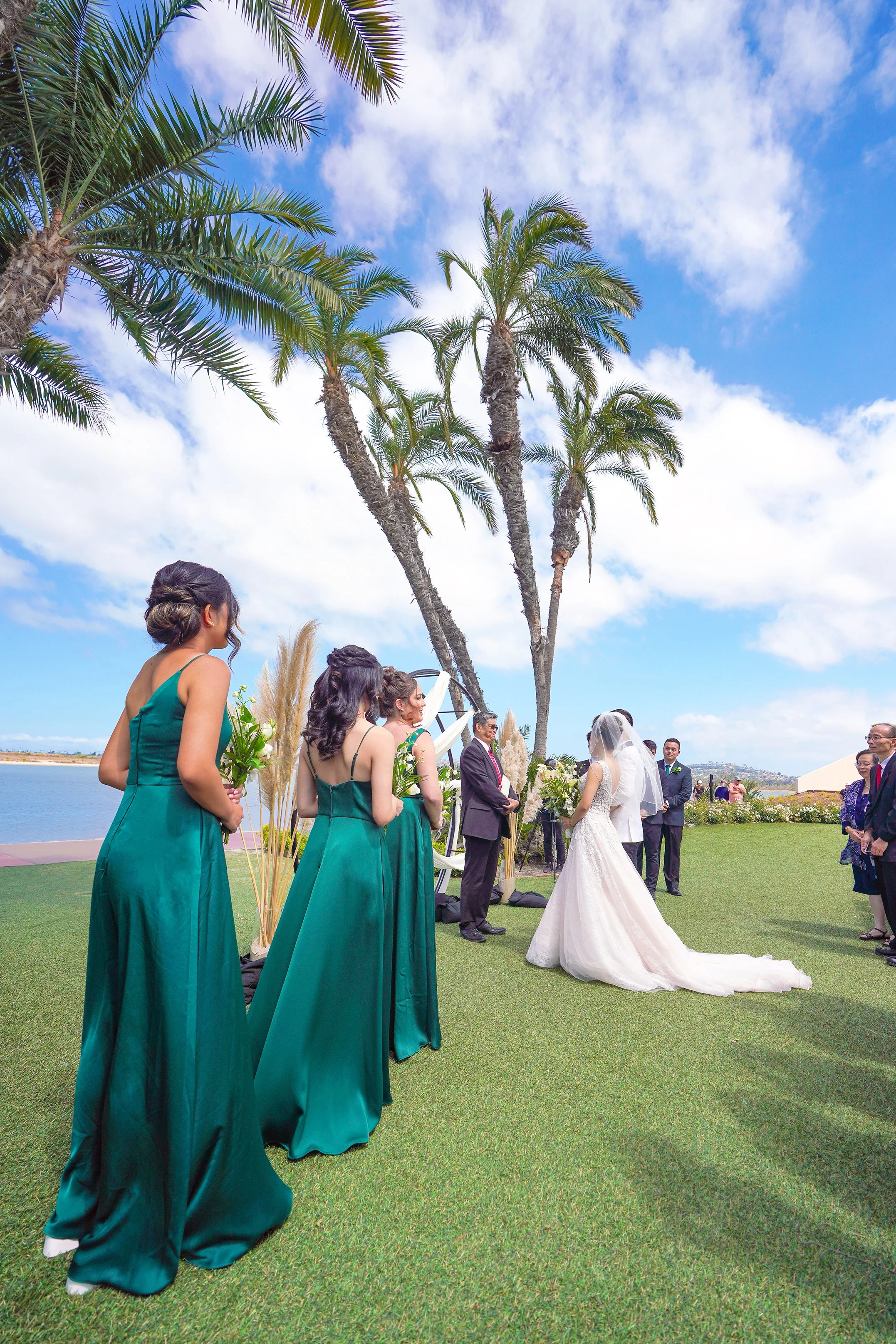 emerald-green-satin-bridesmaid-dresses.jpg