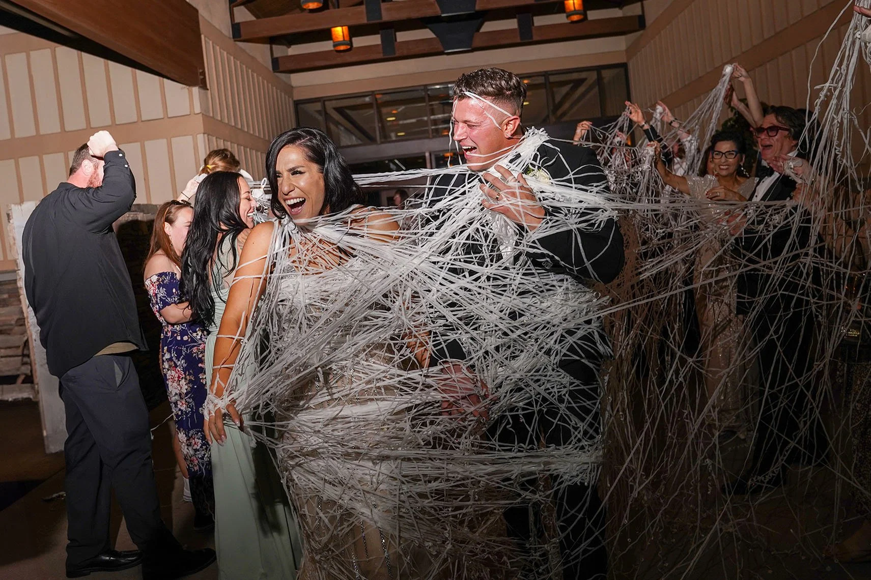 candid-wedding-reception-exit-the-crossings-carlsbad.jpg