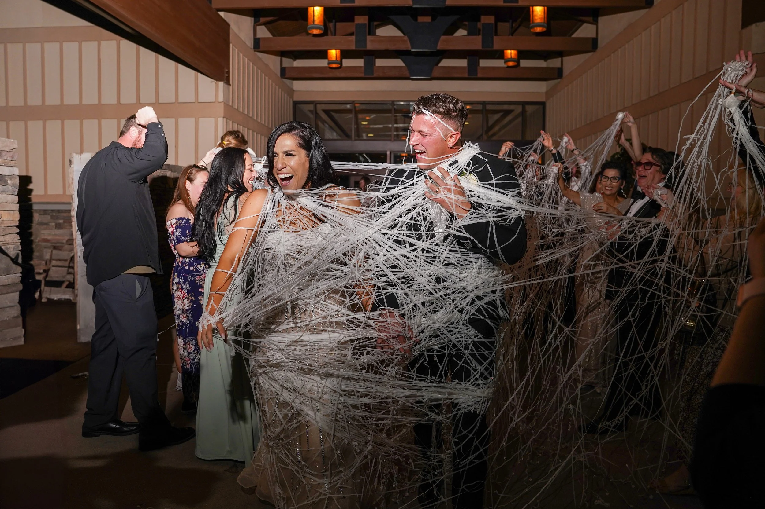 candid-wedding-reception-exit-the-crossings-carlsbad.jpg