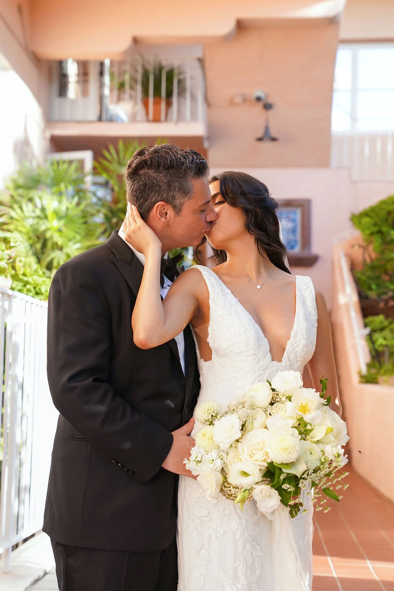 bride-and-groom-kissing-wedding-portrait.jpg