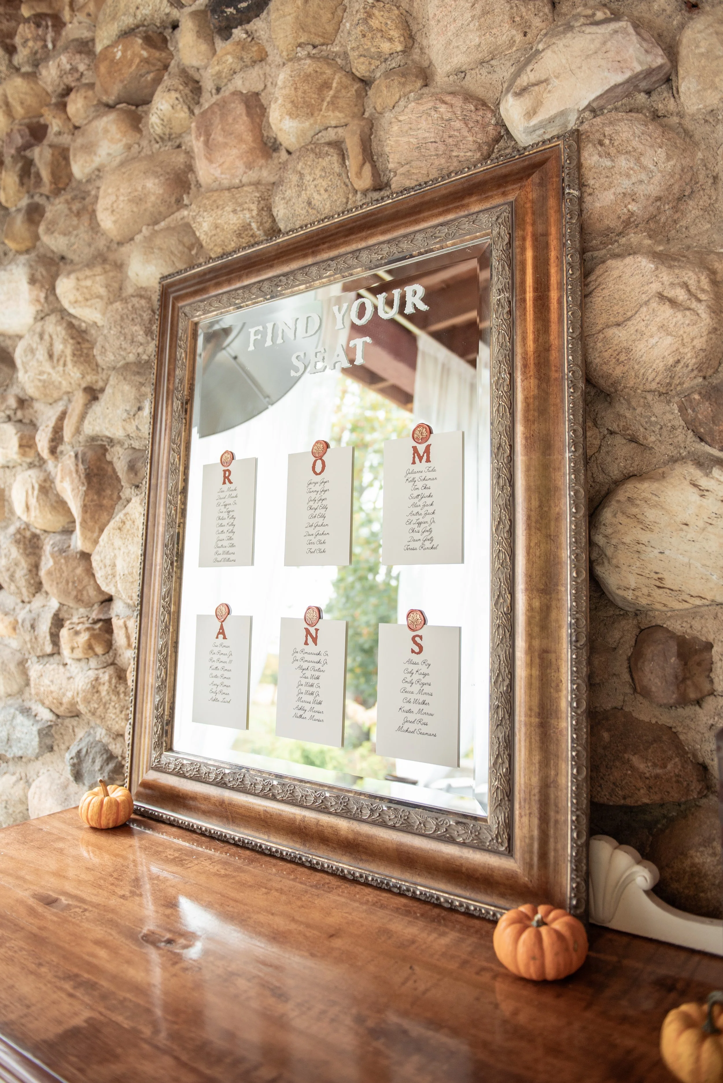 Vinyl lettering, seat placement cards, and wax seal sticker designs for wedding.
Photo credit to Jessica Gill.