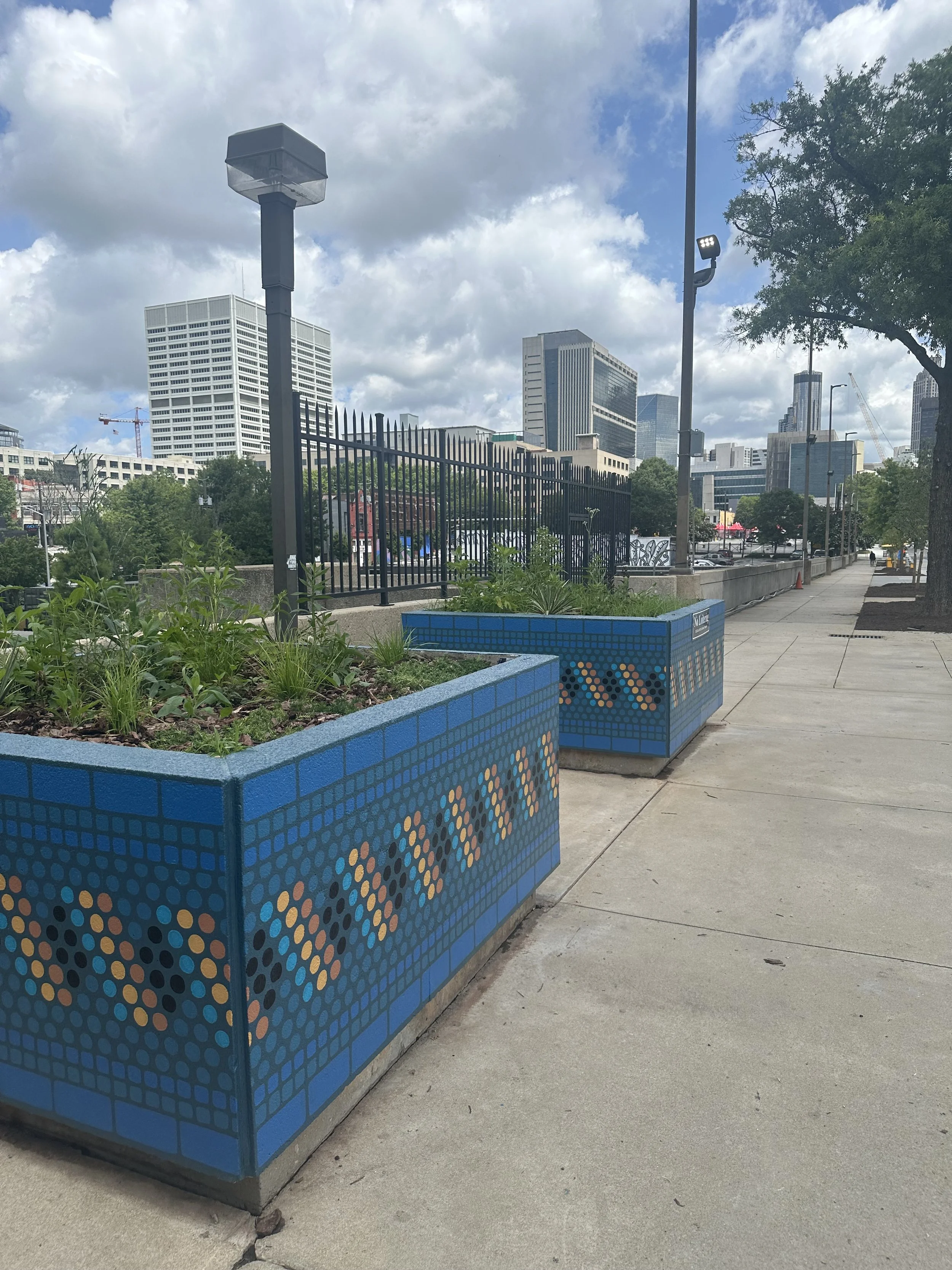 FayeBell-GarnettPlaza-Murals-3 - Faye Kaucher Bell.jpeg