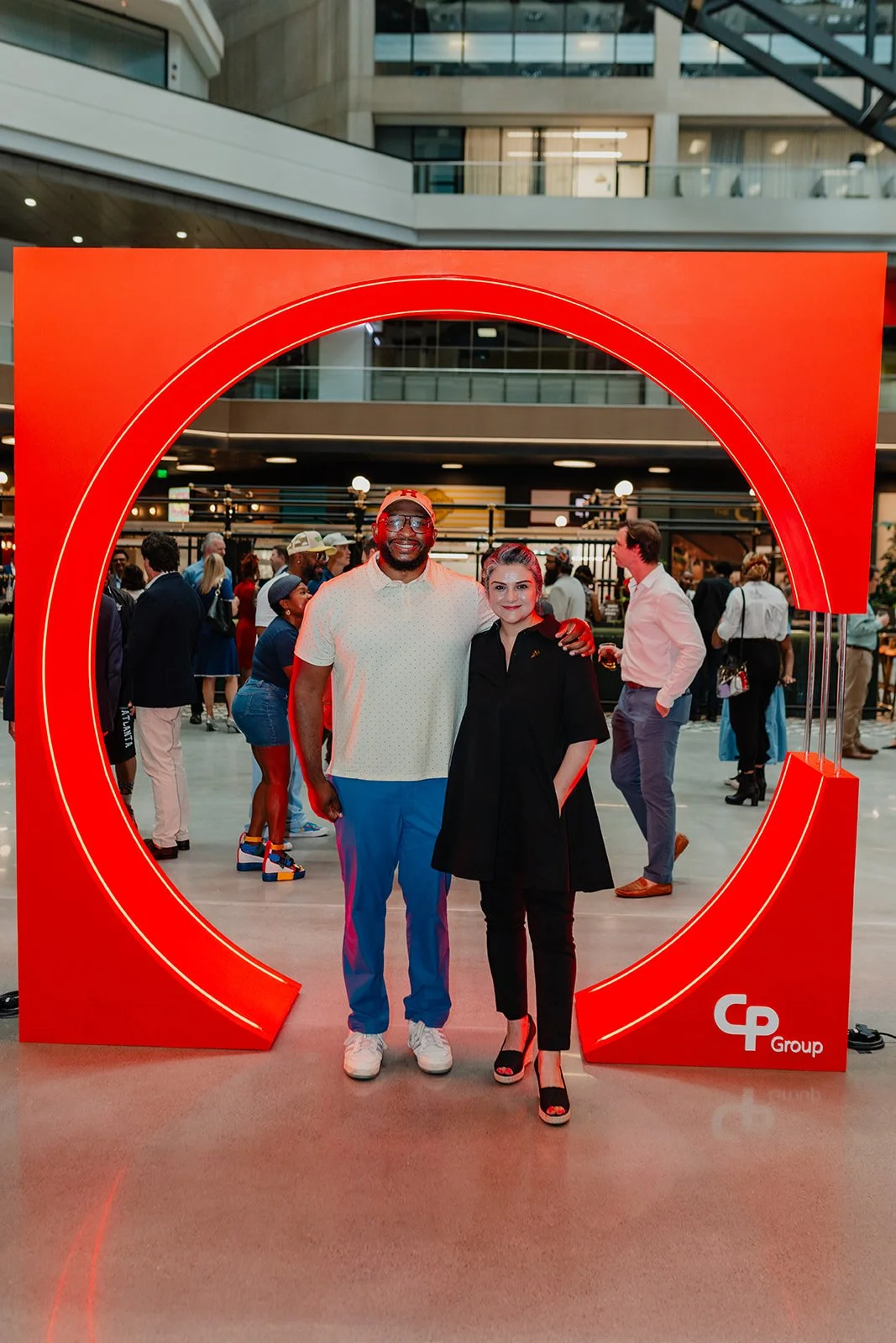 Coop and Neda pictured at the grand reveal of The CTR celebrating her curation of the CTR Culture art collection and program.