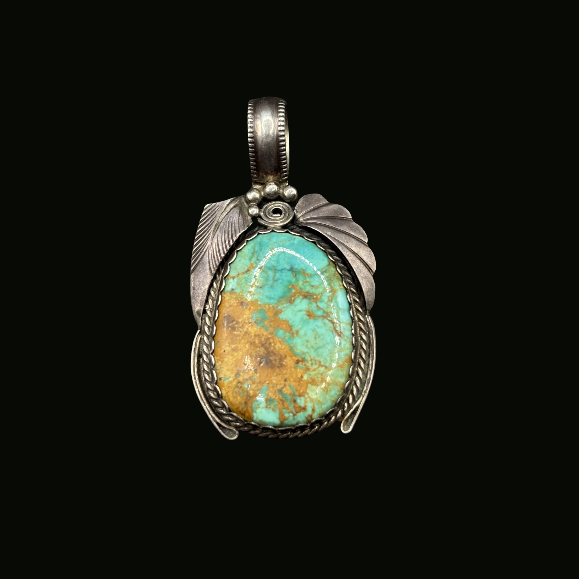 Vintage sterling silver authentic Navajo Justin Morris signed turquoise pendant
