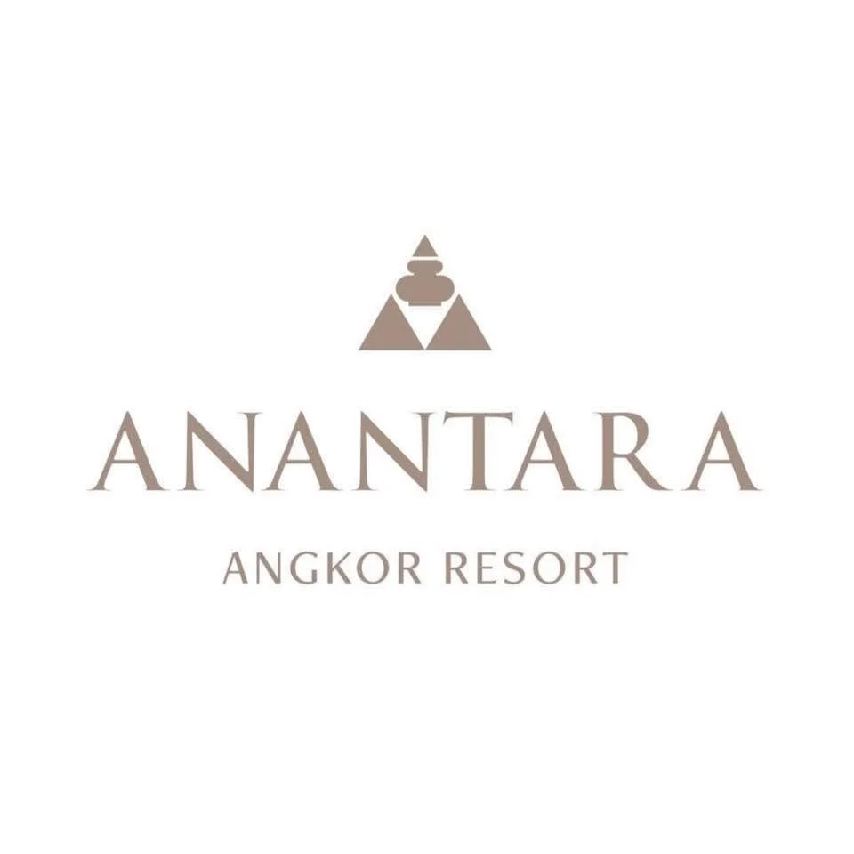 Logo of Anantara Angkor Resort featuring a stylized pyramid with a lotus flower design and the resort's name in elegant font.