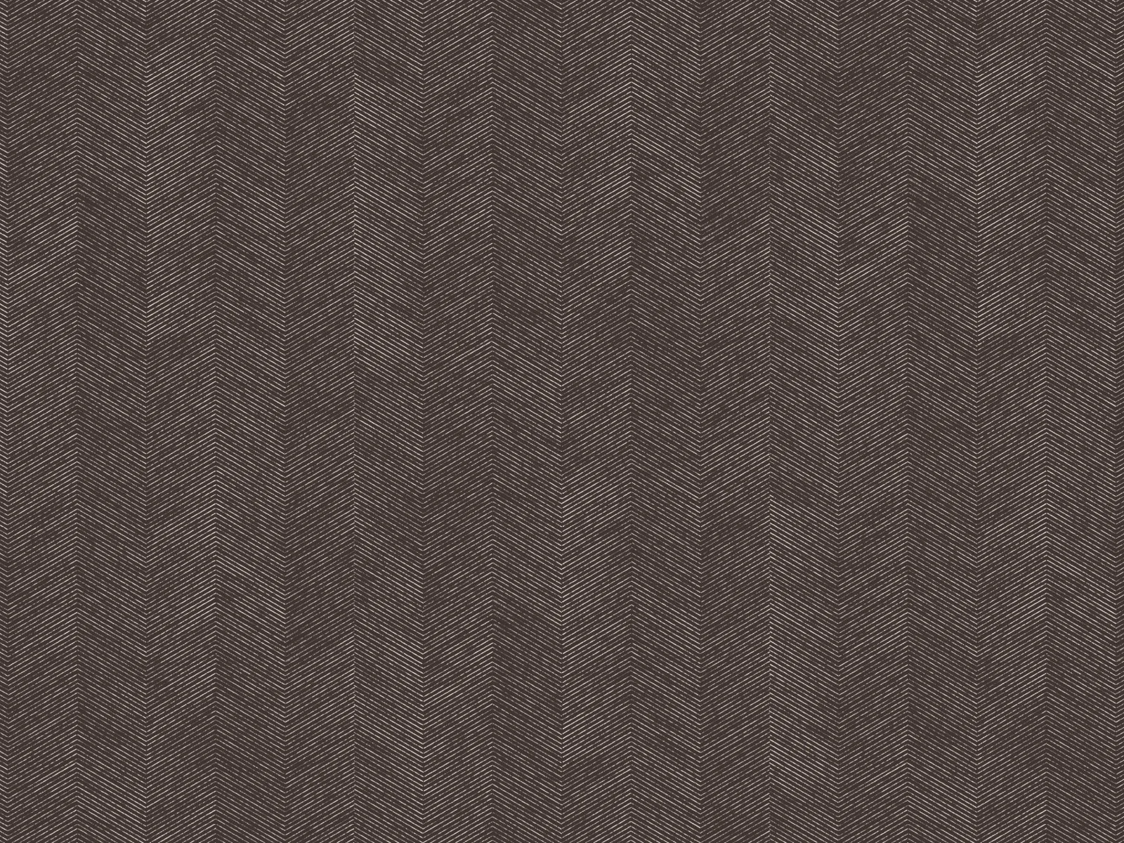 A black carpet with a zigzag pattern made of thin white lines.