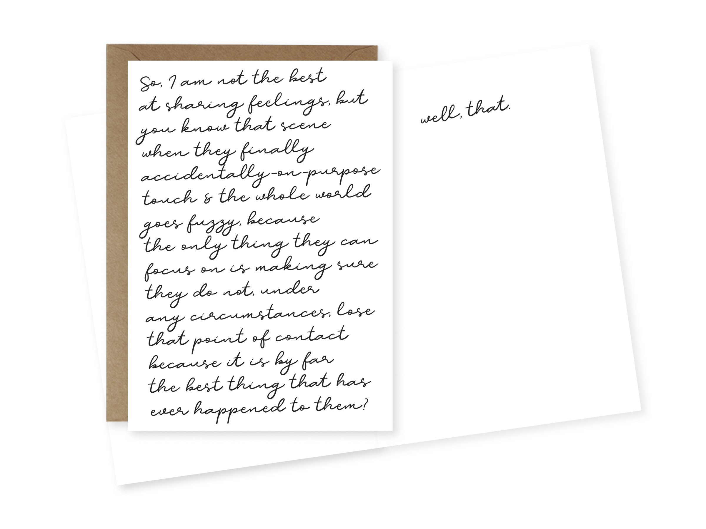 A close-up of a handwritten card with cursive black ink, partially visible on a white background, with a brown envelope behind it.