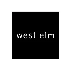 Black background with white lowercase text reading "west elm" in the center.
