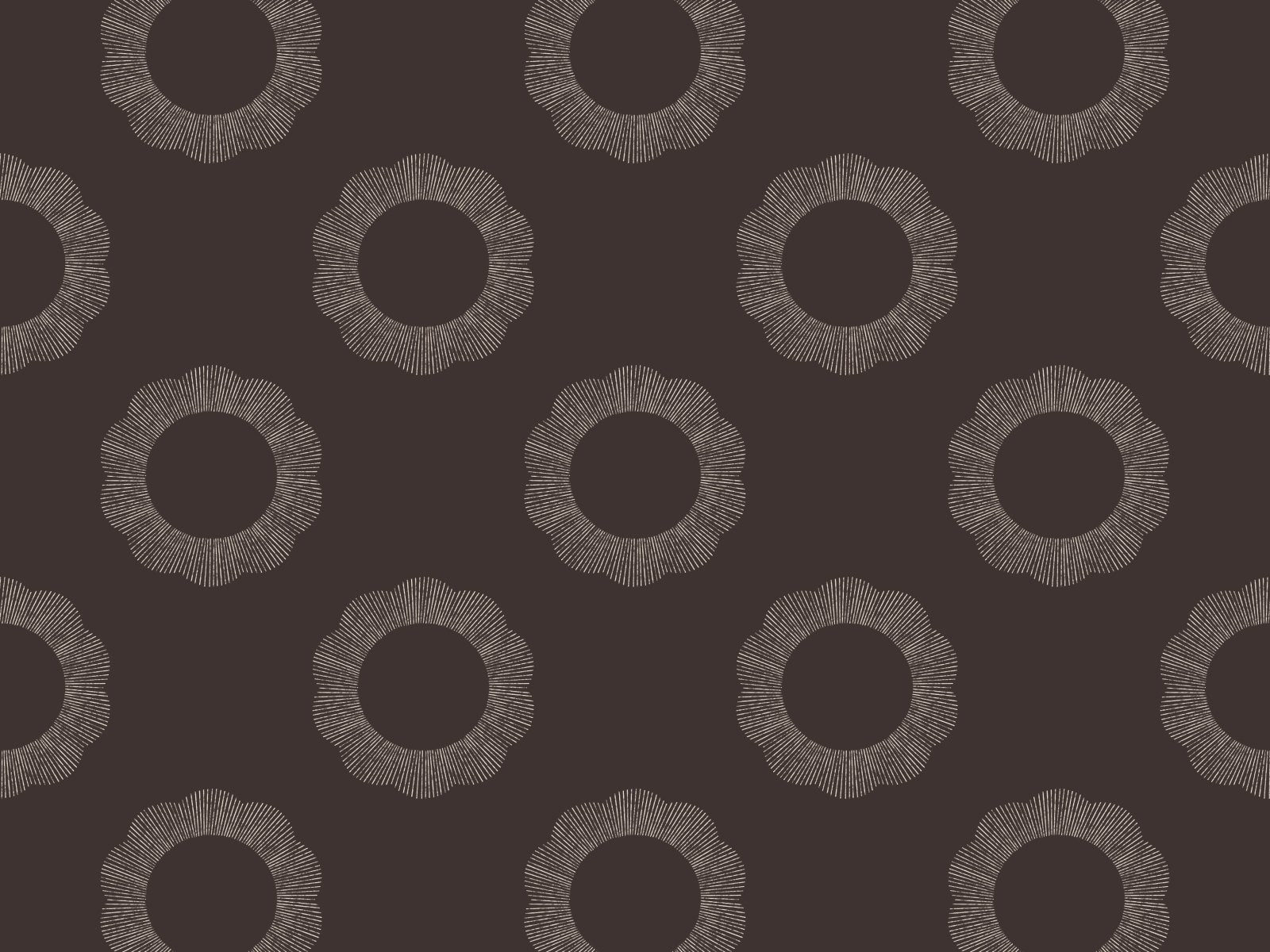 A dark background with a repeating pattern of white, circular, flower-like shapes formed by radiating lines.
