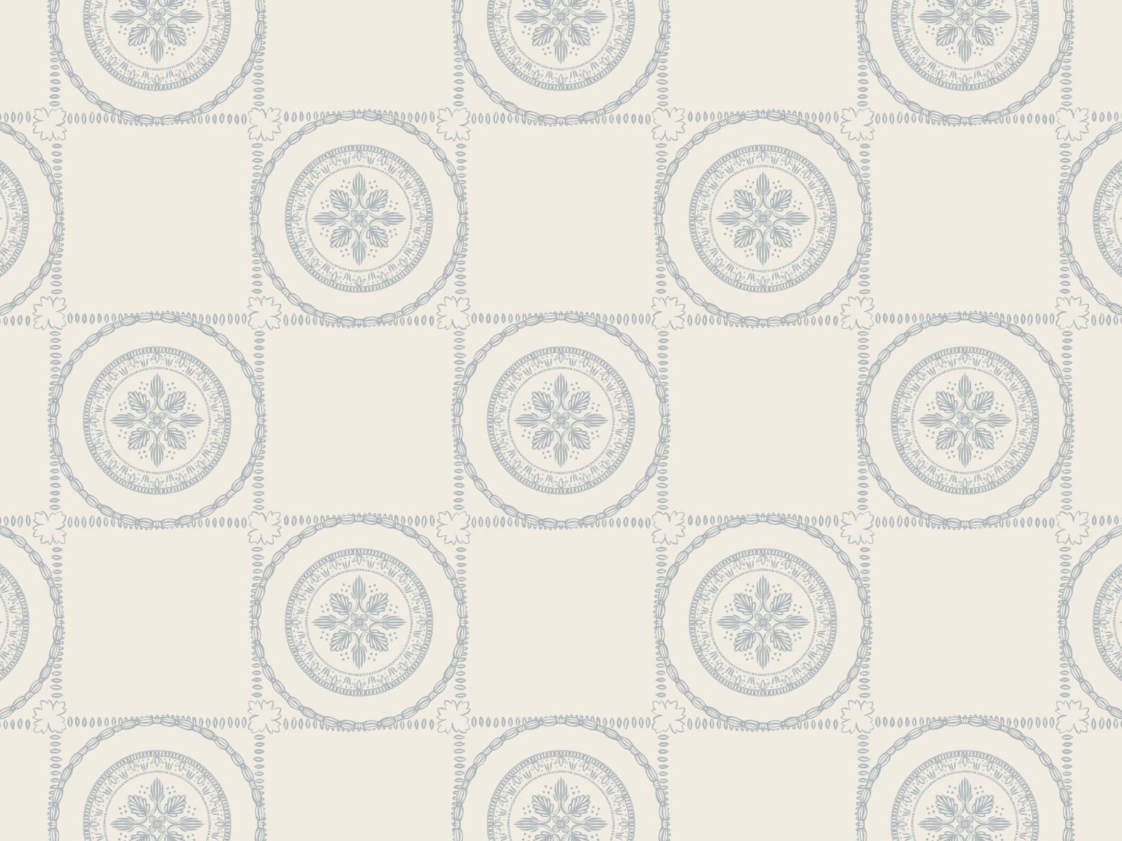 A repeating pattern with a beige background and blue circular designs, each containing a floral motif in the center, arranged in a grid.