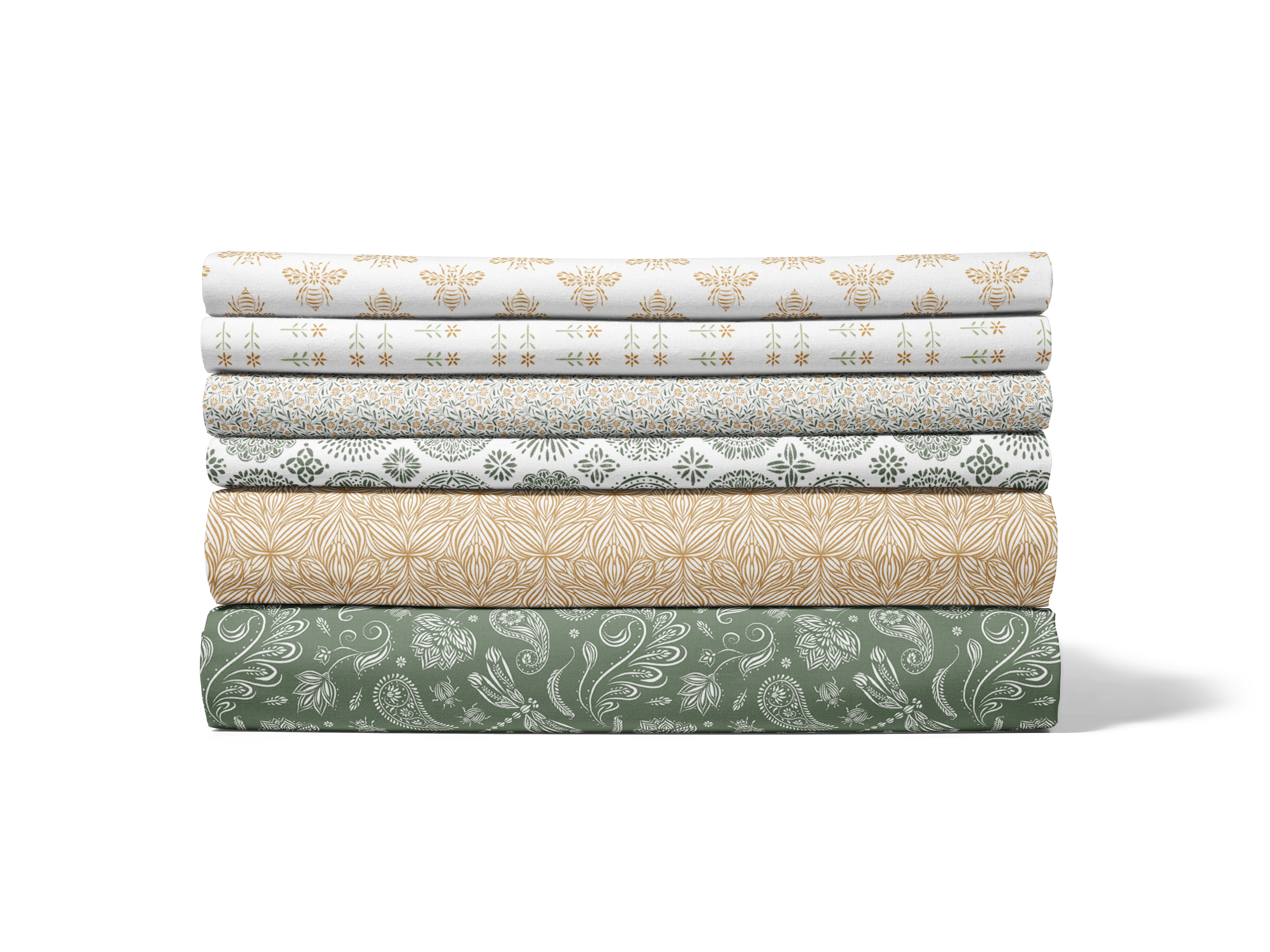 Stacked fabric rolls with floral and botanical patterns in white, beige, green, and gray colors.