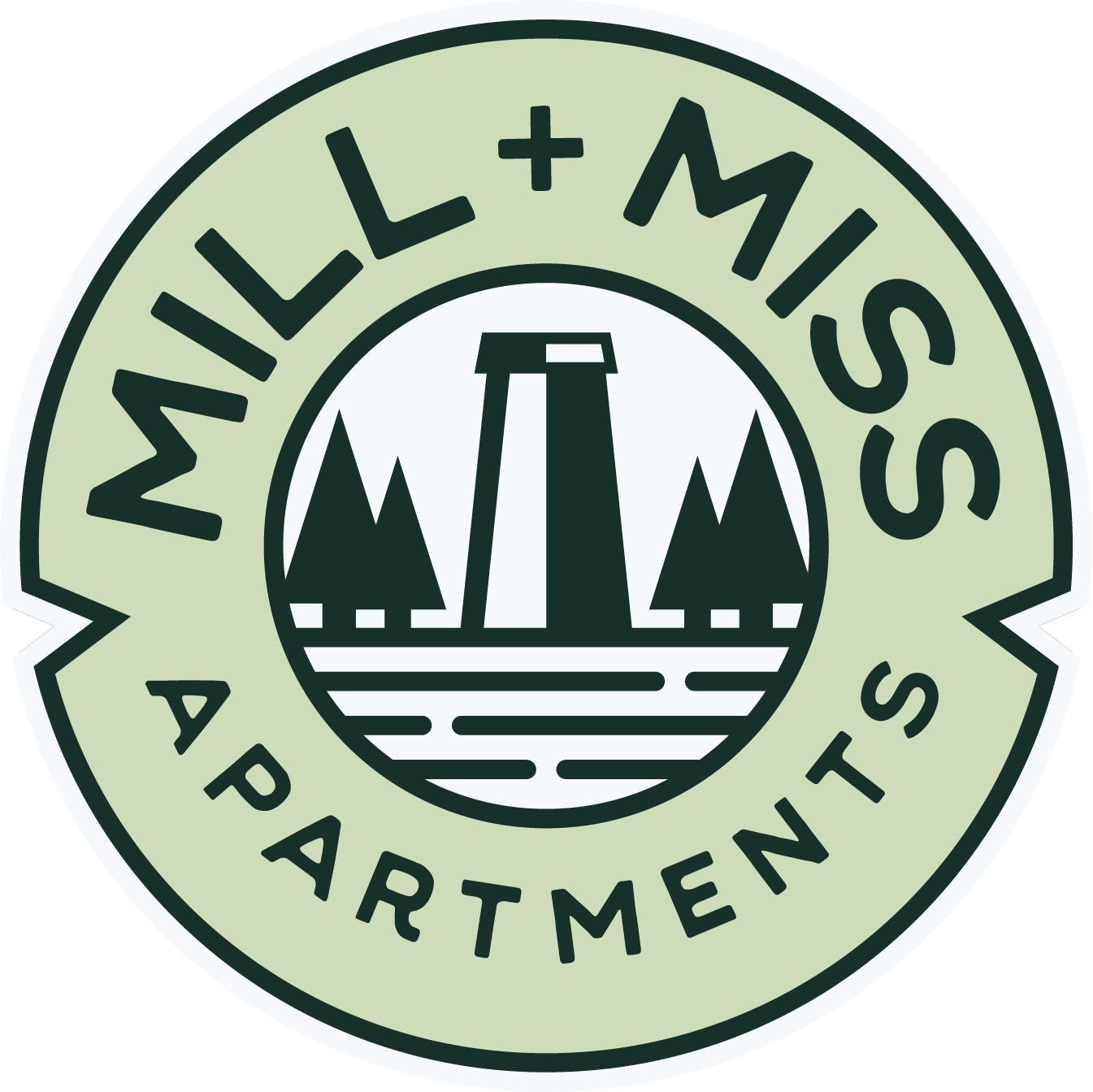 Logo emblem with a central image of a bridge and trees, with the text 'Mill + Miss Apartments' around the border.