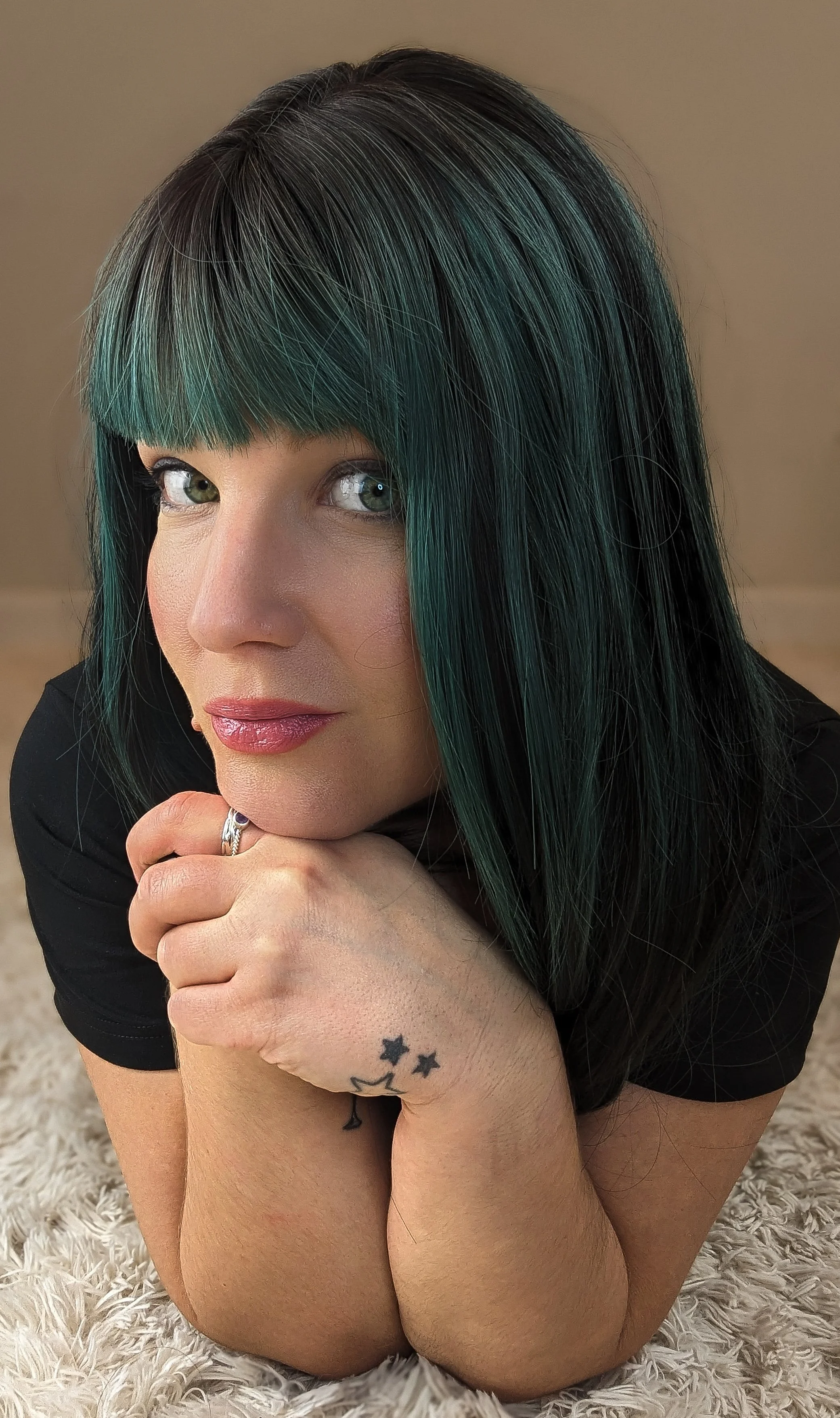 portrait of woman with green hair