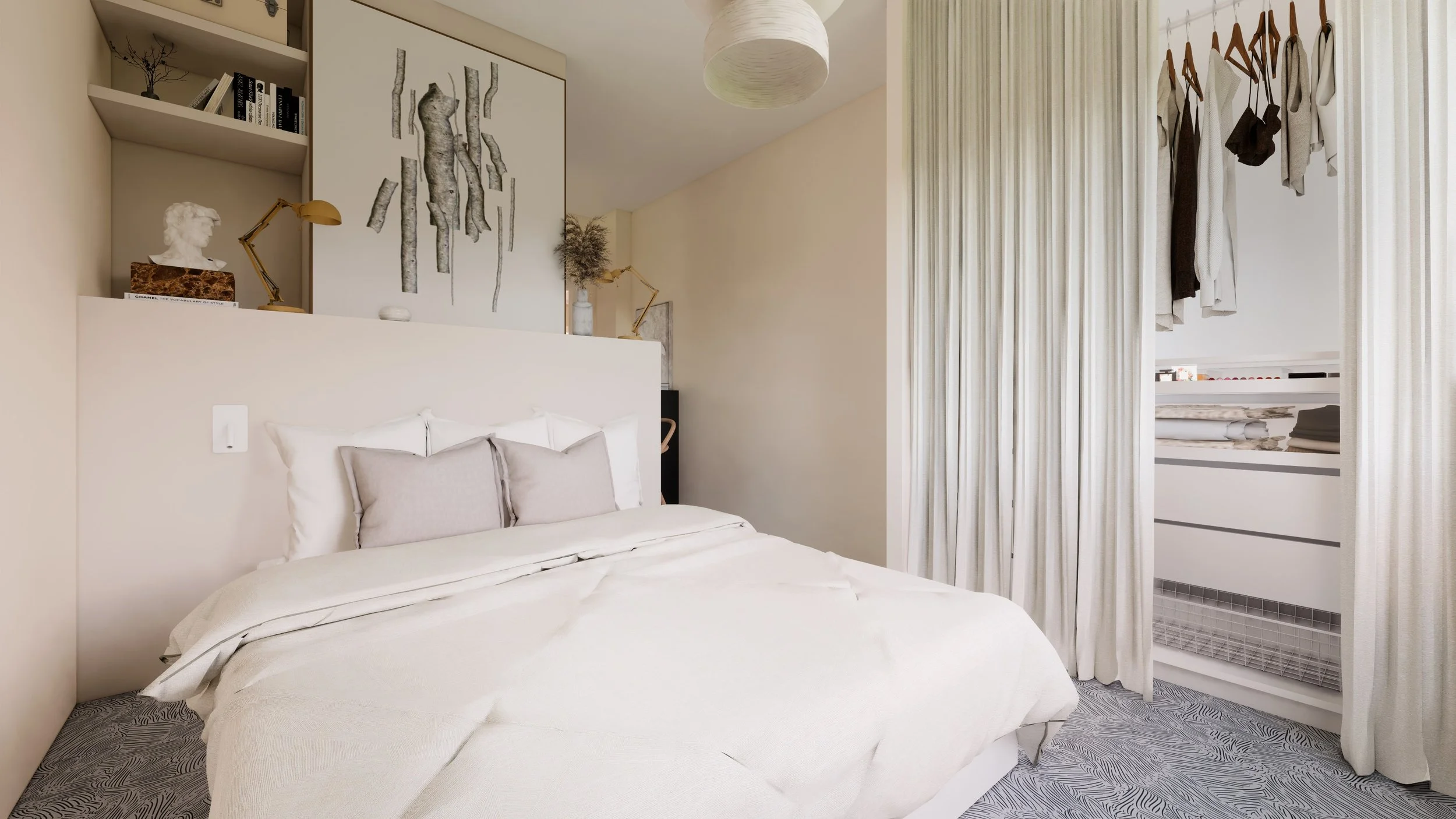 Chambre minimaliste avec lit blanc, étagère avec livres et décoration, penderie avec vêtements suspendus, et une armoire ouverte. Décor épuré dans des tons neutres.