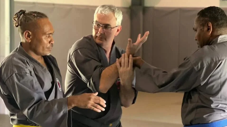 Ross Cameron demonstrating a Japanese Jujitsu technique during an international martial arts seminar.