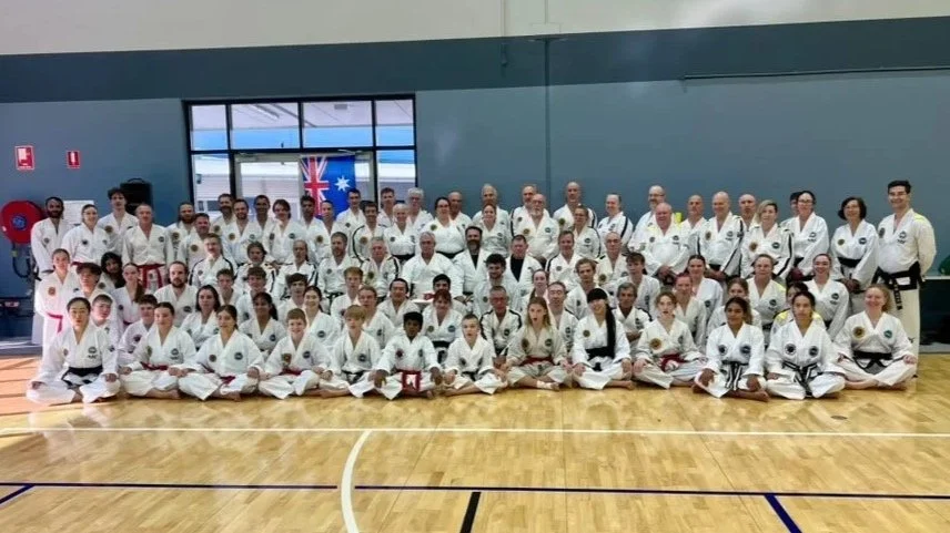 Group photo with Ross Cameron and seminar participants following an international martial arts training event.