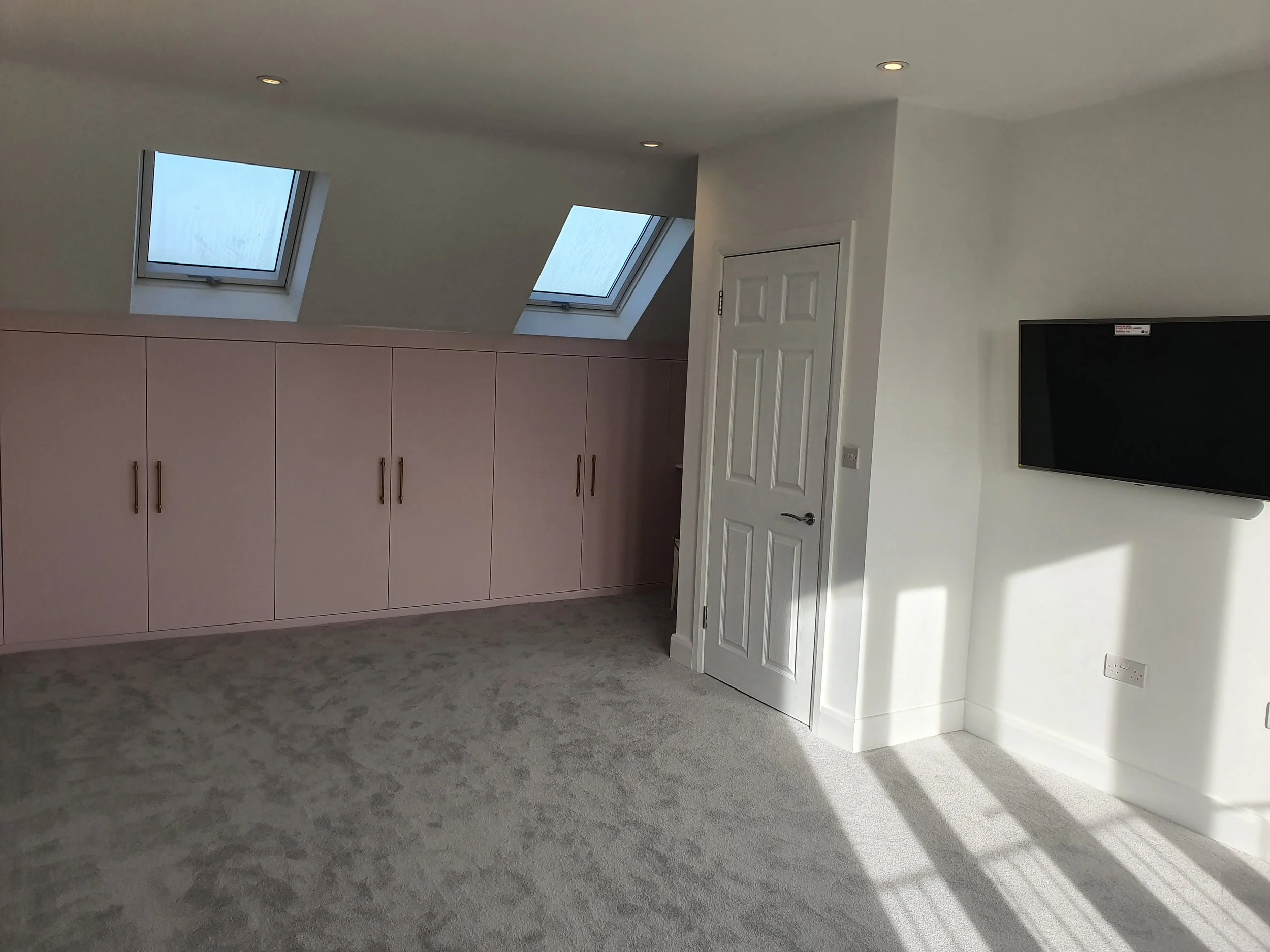 Loft-conversion-bespoke-wardrobes-Wesy-Barnes-Lane-Surrey-1.jpeg
