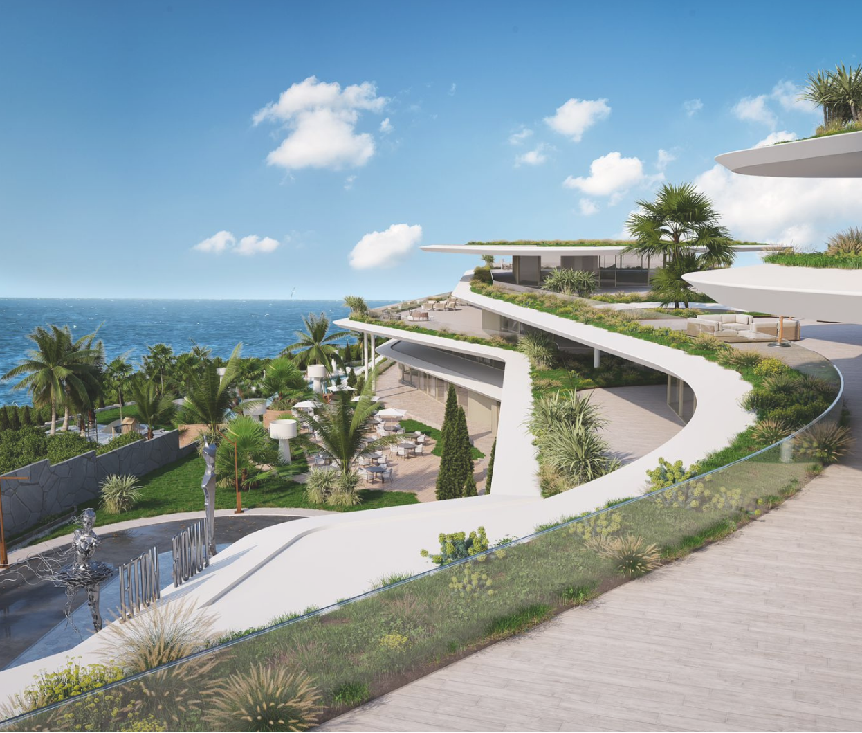 A modern, multi-level beachfront building with curved white terraces and gardens, overlooking a blue ocean with palm trees and a clear sky.