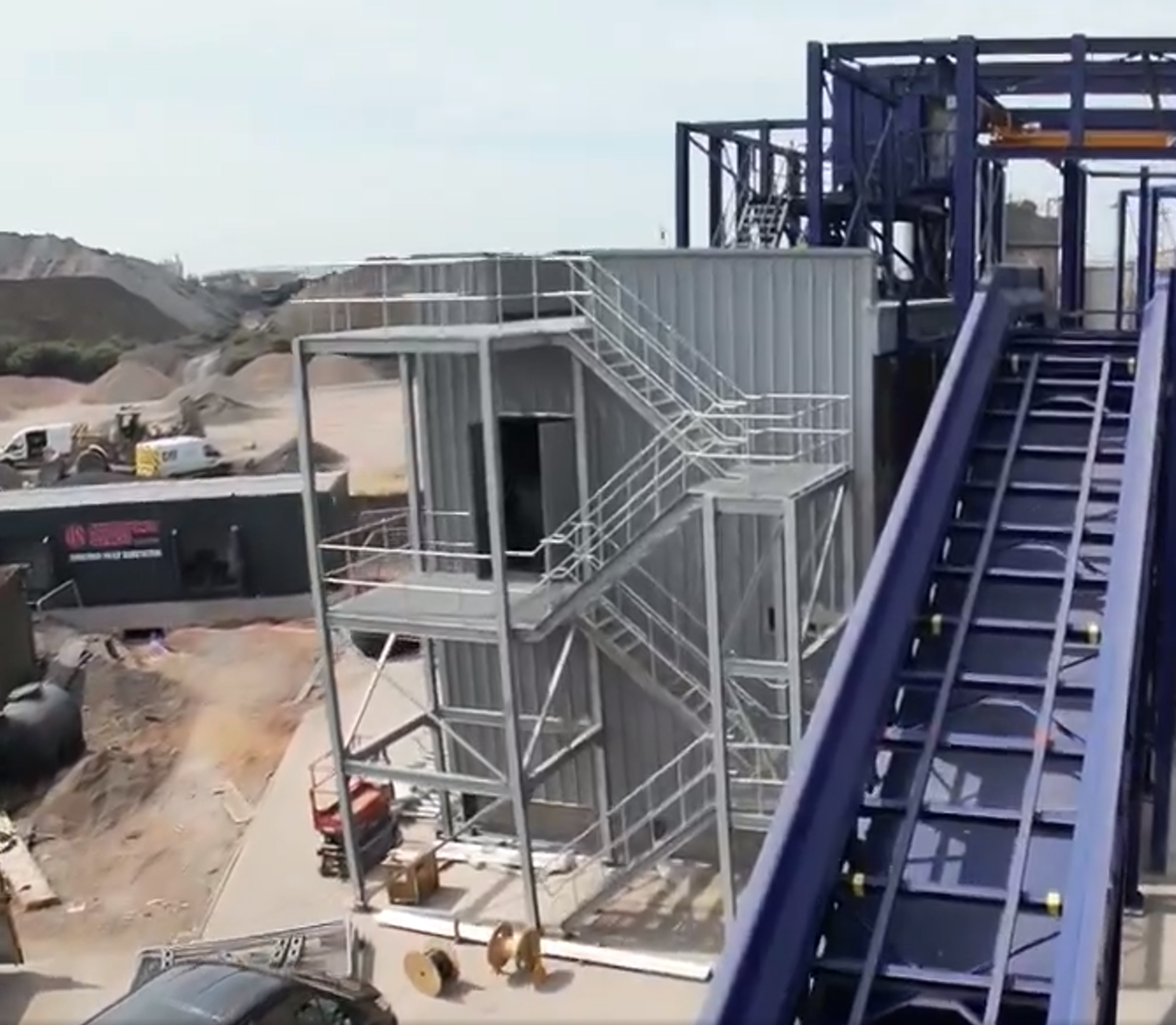 Installed steel stairway connecting ground level to the elevated control tower