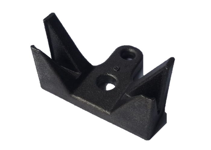 Black metal or plastic automotive part with two mounting holes and angular features, possibly a bracket or mounting block.