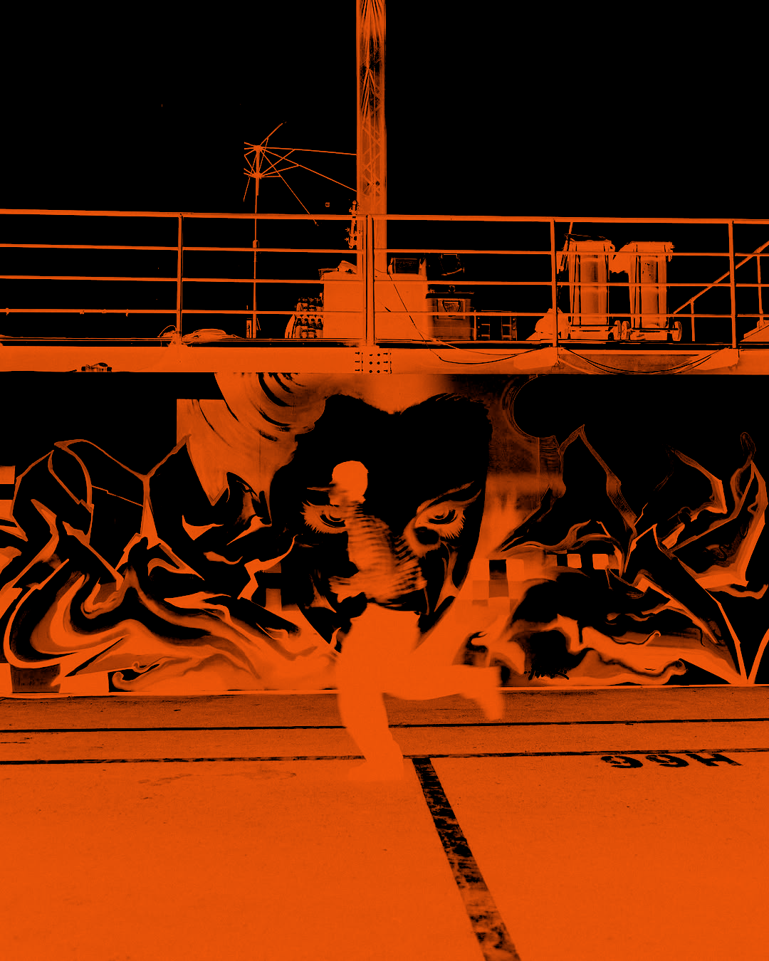 Street art mural of a panther's face with glowing eyes, with a rooftop scene featuring a communications tower and equipment above.
