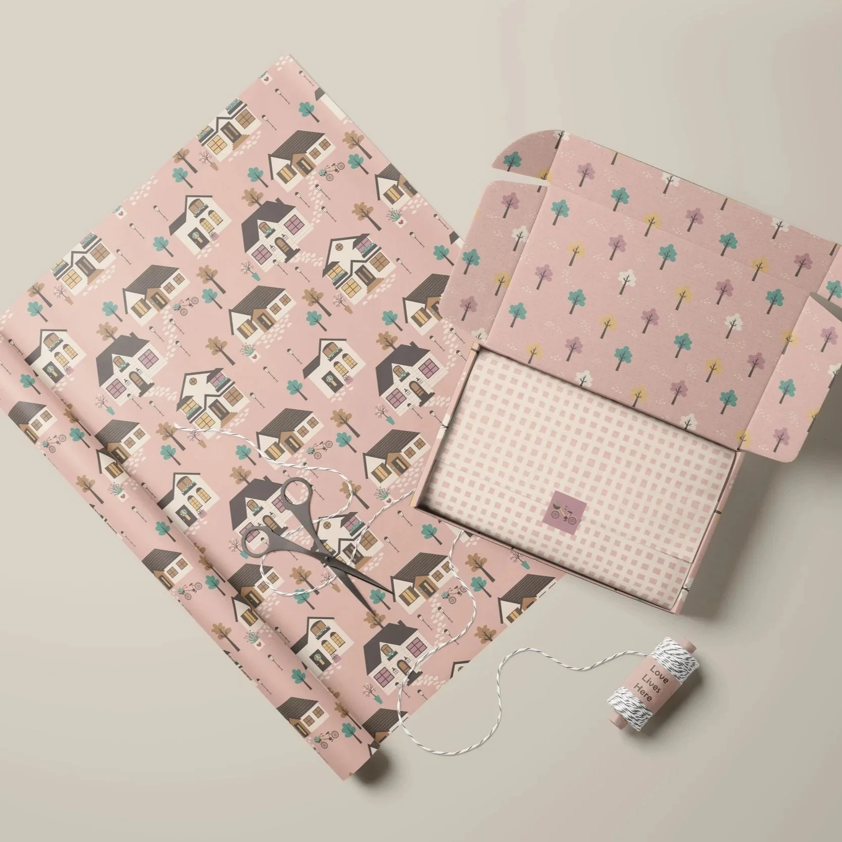 Premium packaging mockup featuring the Love Lives Here collection designed for boutique gift boxes, stationery and coordinated paper goods.