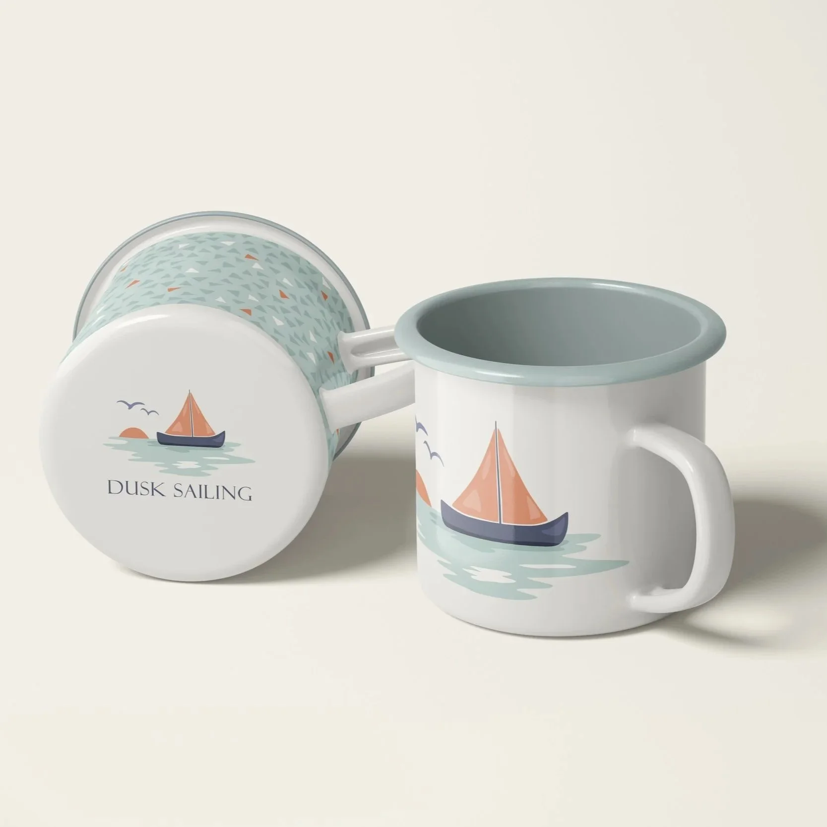 Enamel Mugs featuring coordinated nautical surface pattern designs.