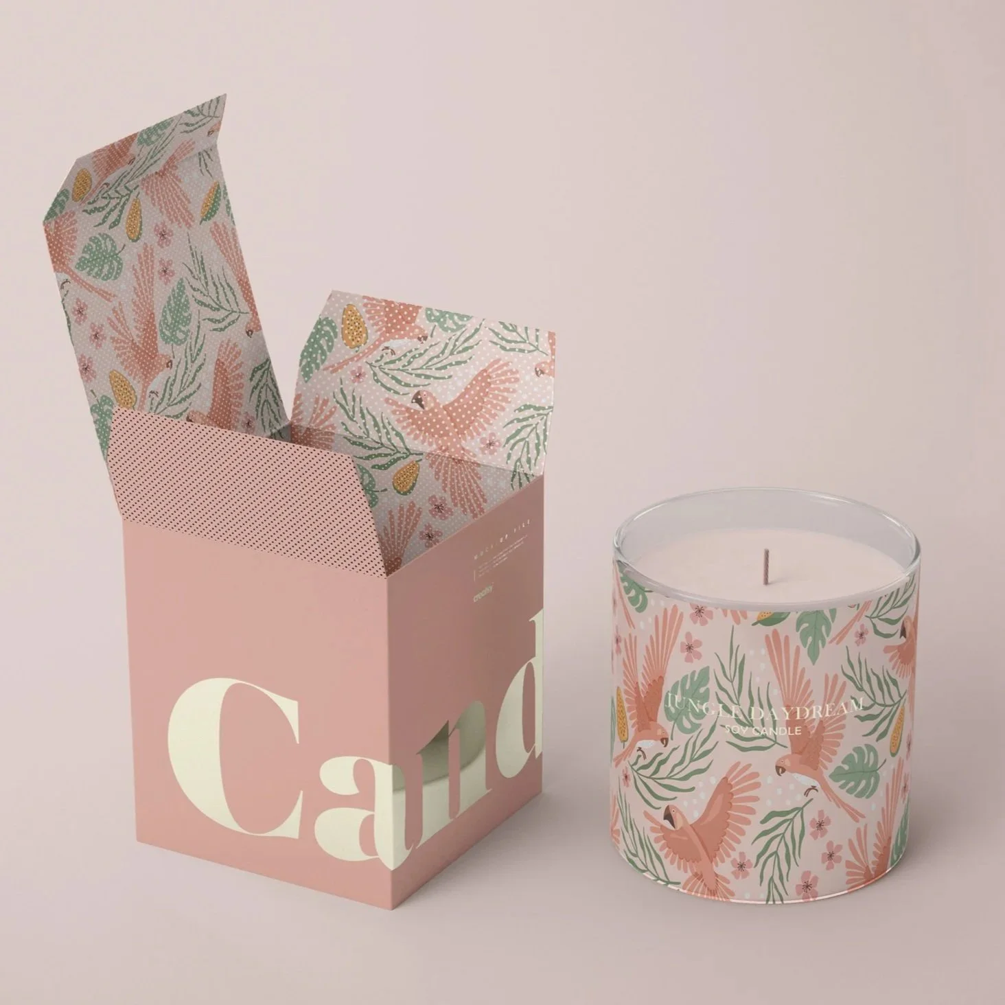 Boutique shopping bag and candle packaging mockup featuring coordinated tropical surface pattern designs from the Jungle Daydream collection.