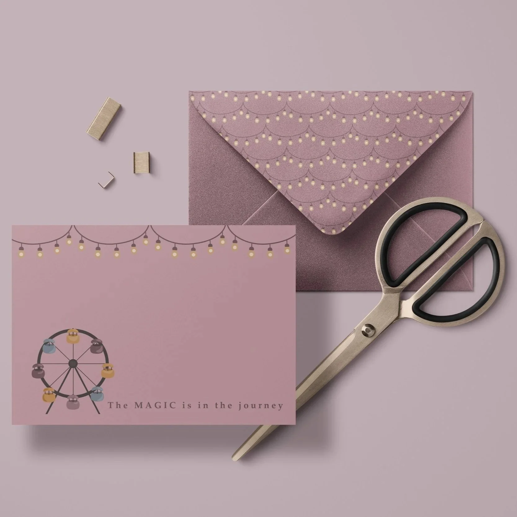 Stationery card and envelope mockup showcasing coordinated paper goods from the Dusk Fairground collection.