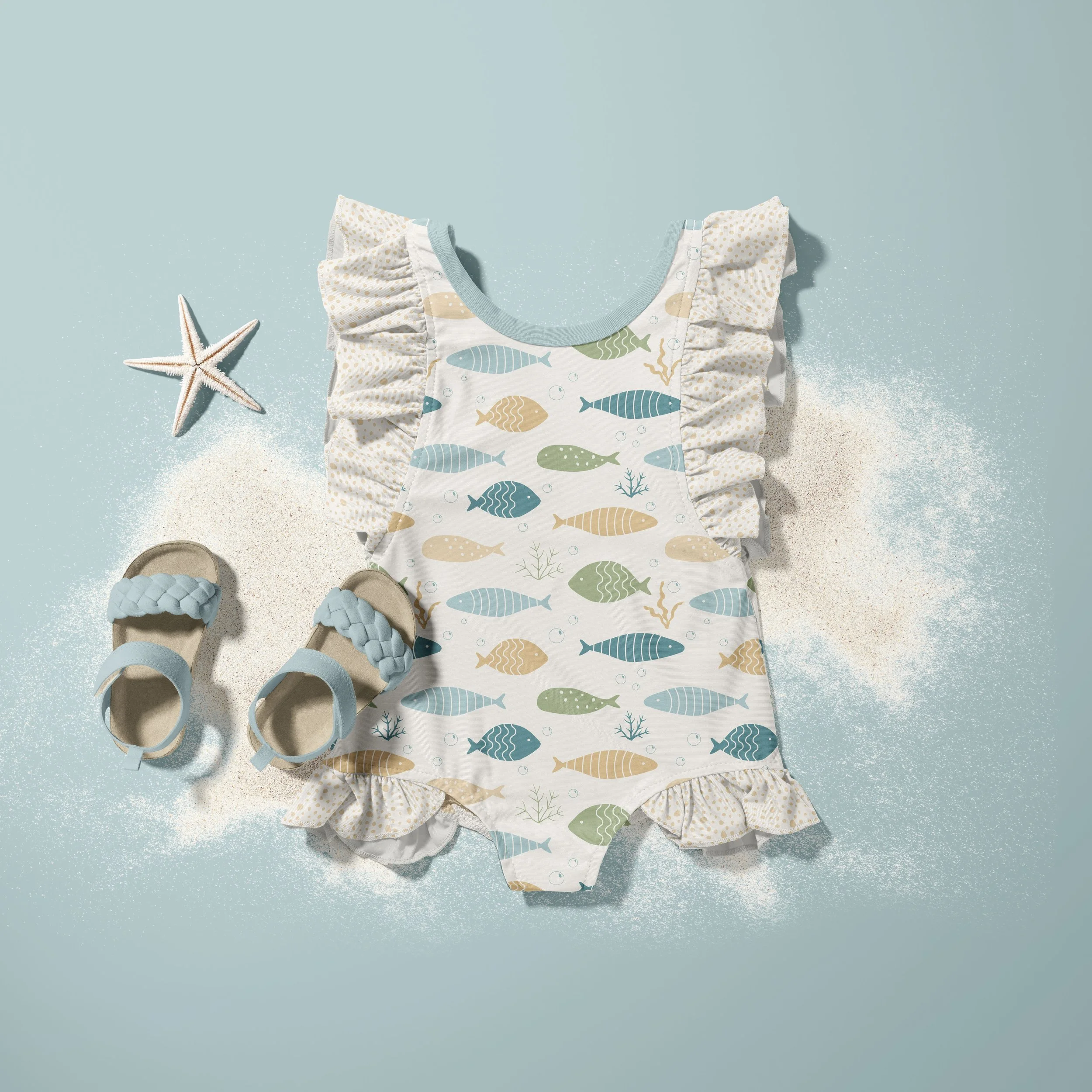 Children's swimwear mockup featuring the Coastal Coral Reef collection in the Seafoam Calm colorway with coordinating underwater surface pattern designs.
