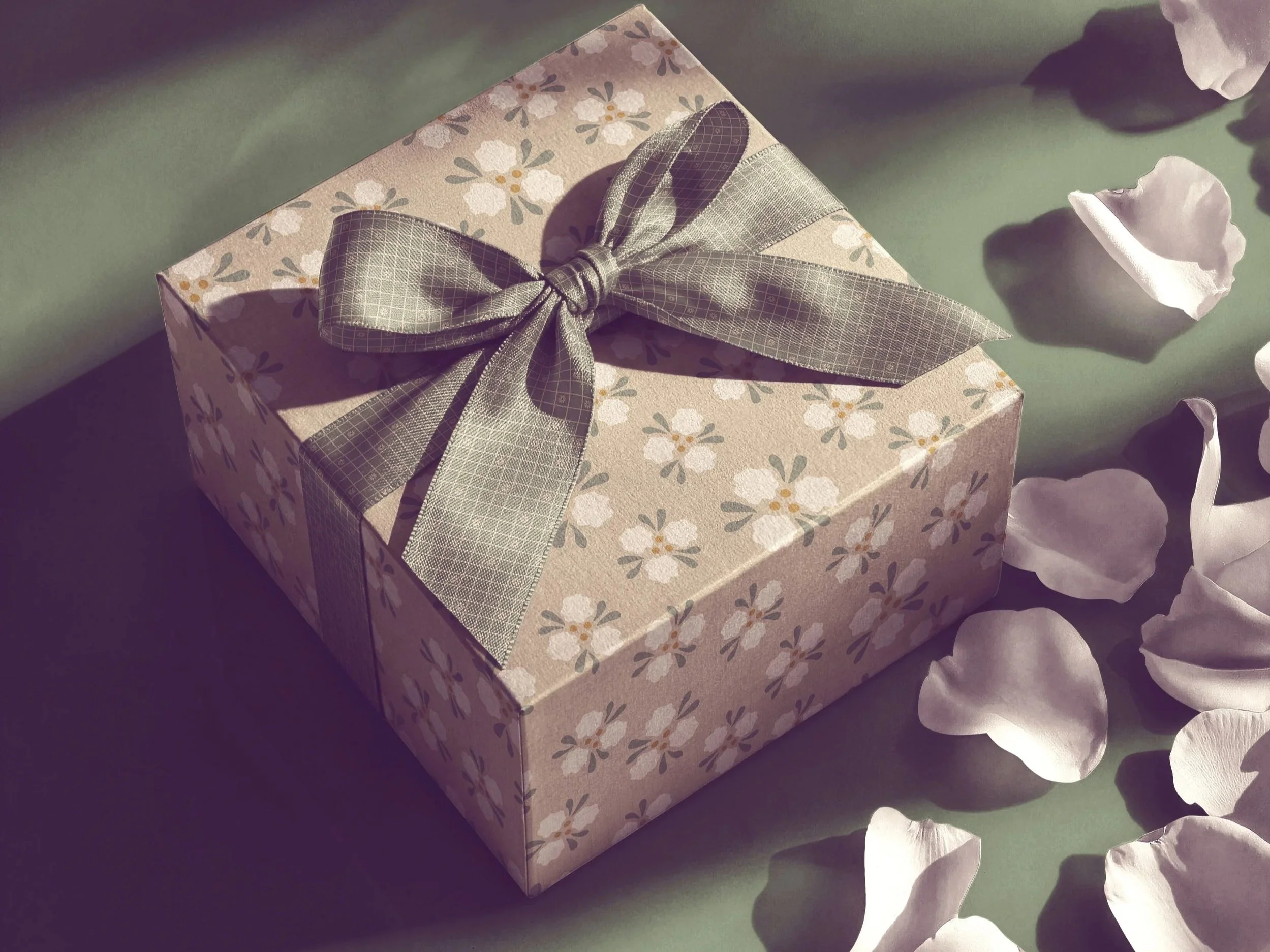 Gift box featuring the Garden Poetry surface pattern collection, showing how illustrated collections become packaging designs.