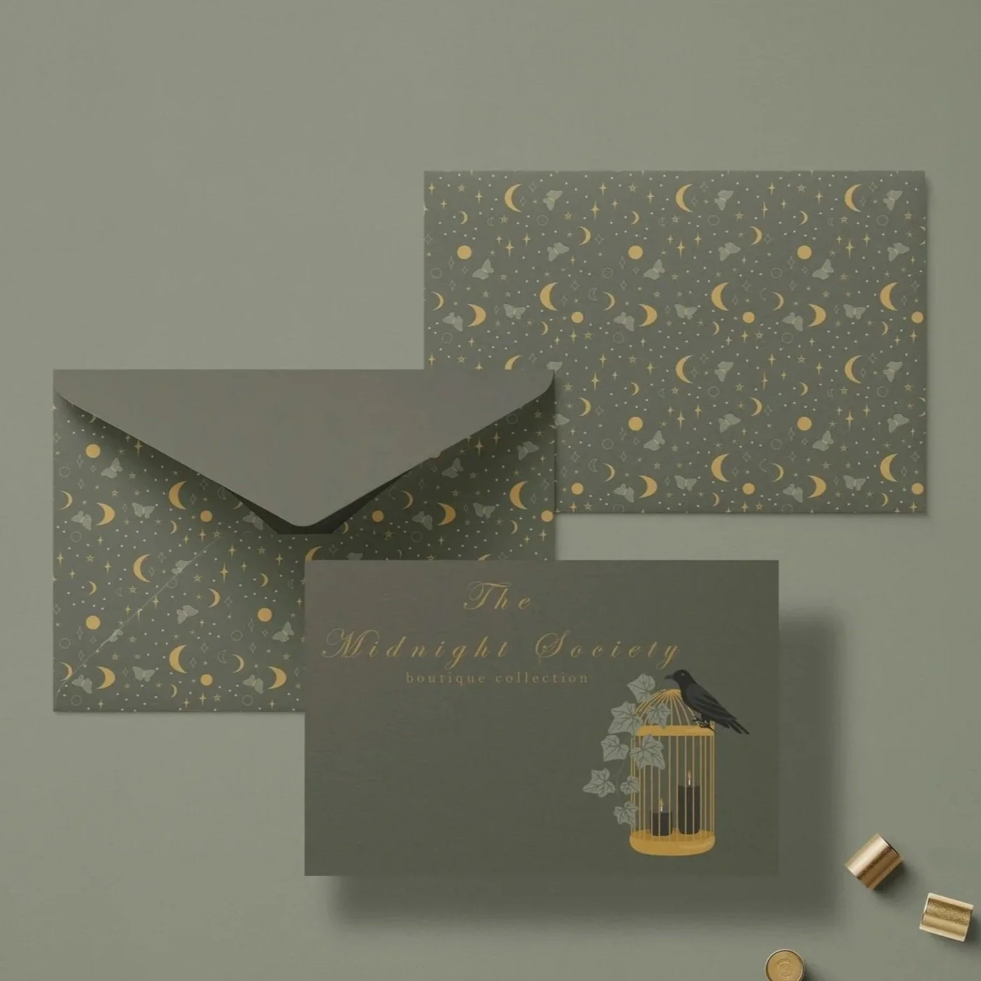 Greeting cards and envelopes mockup featuring coordinated stationery designs from The Midnight Society collection.