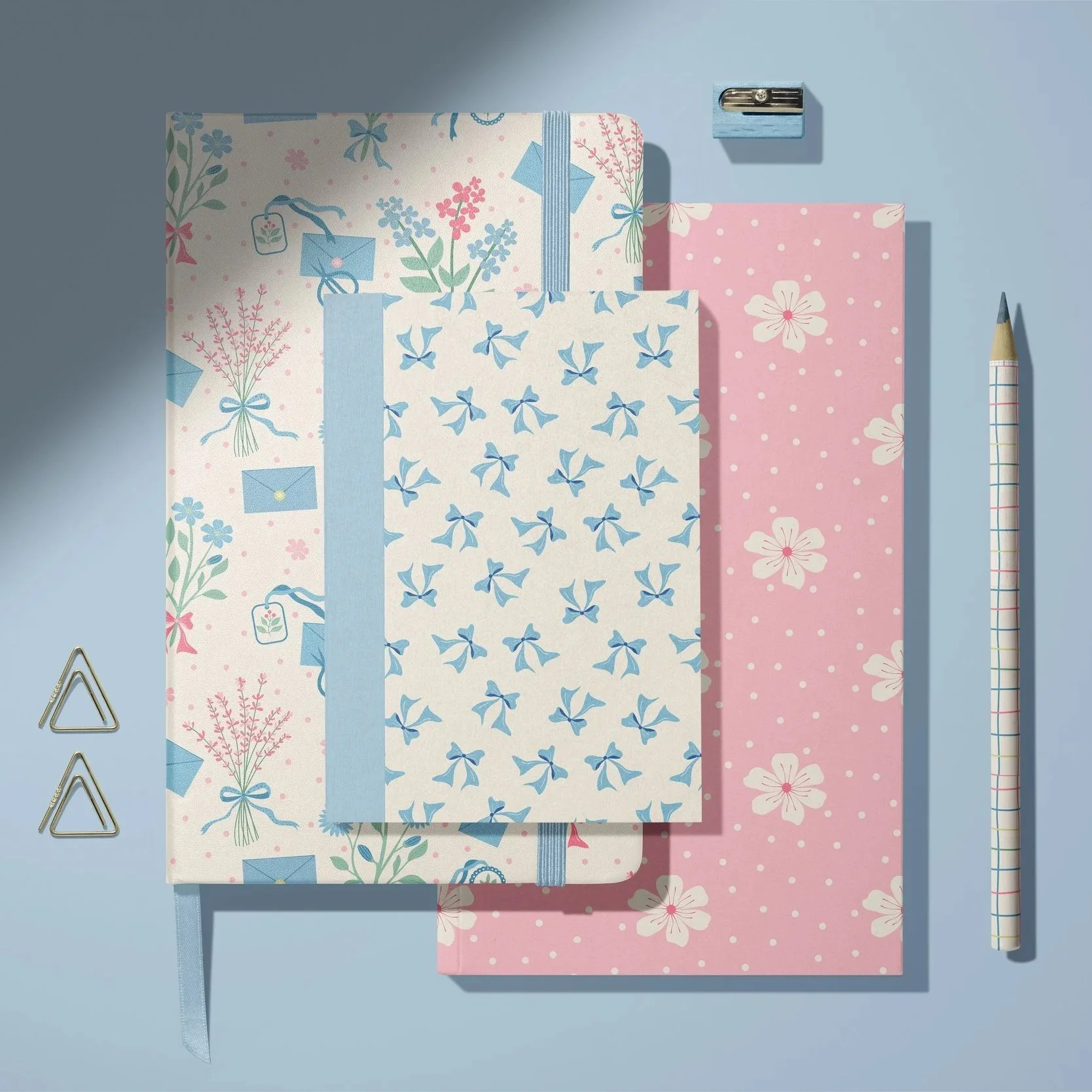 Premium stationery collection featuring Studio Spring floral patterns applied to notebooks, journals, planners and coordinating paper accessories.