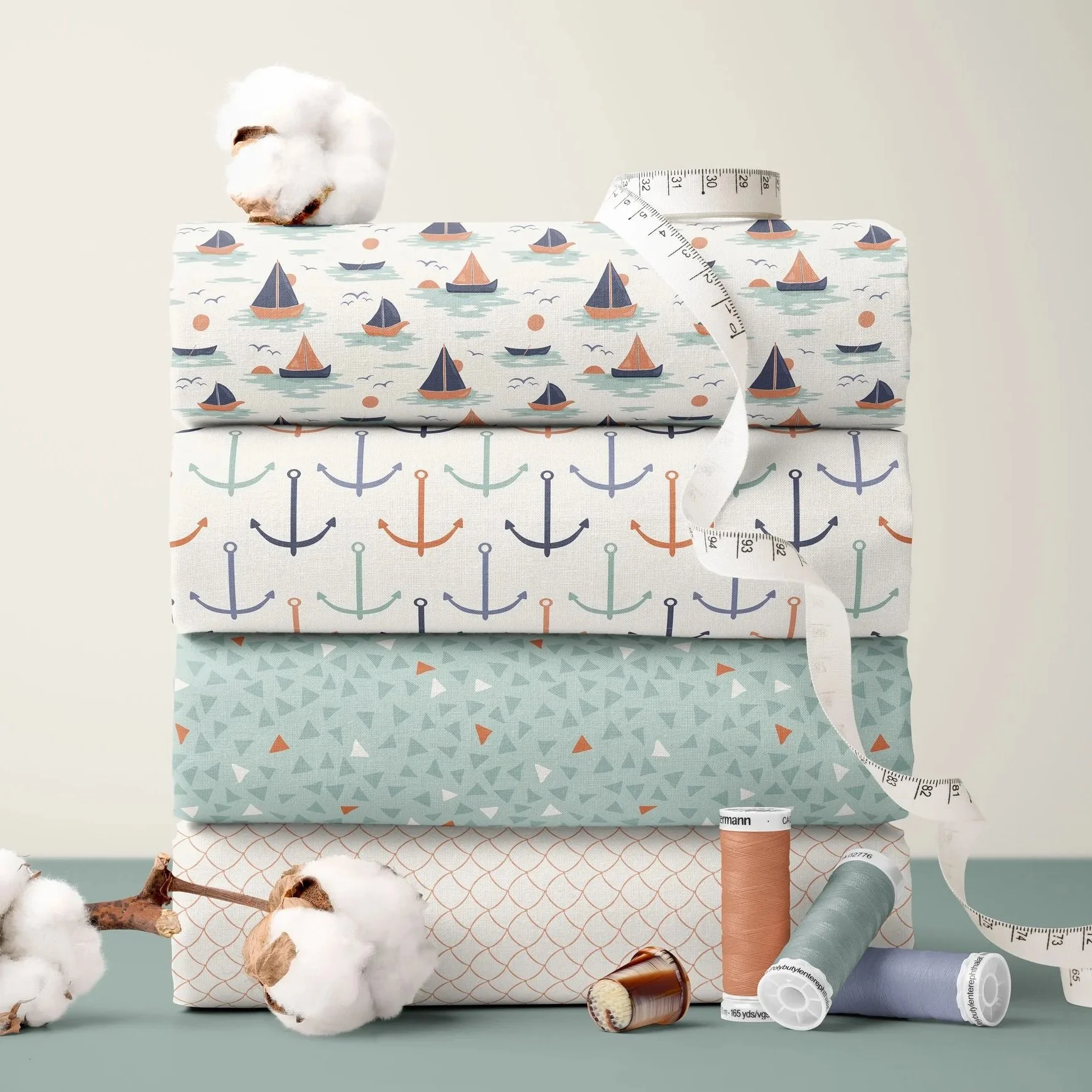 Fabric collection mockup featuring coordinated Dusk Sailing nautical surface patterns for quilting, textiles and home décor applications.